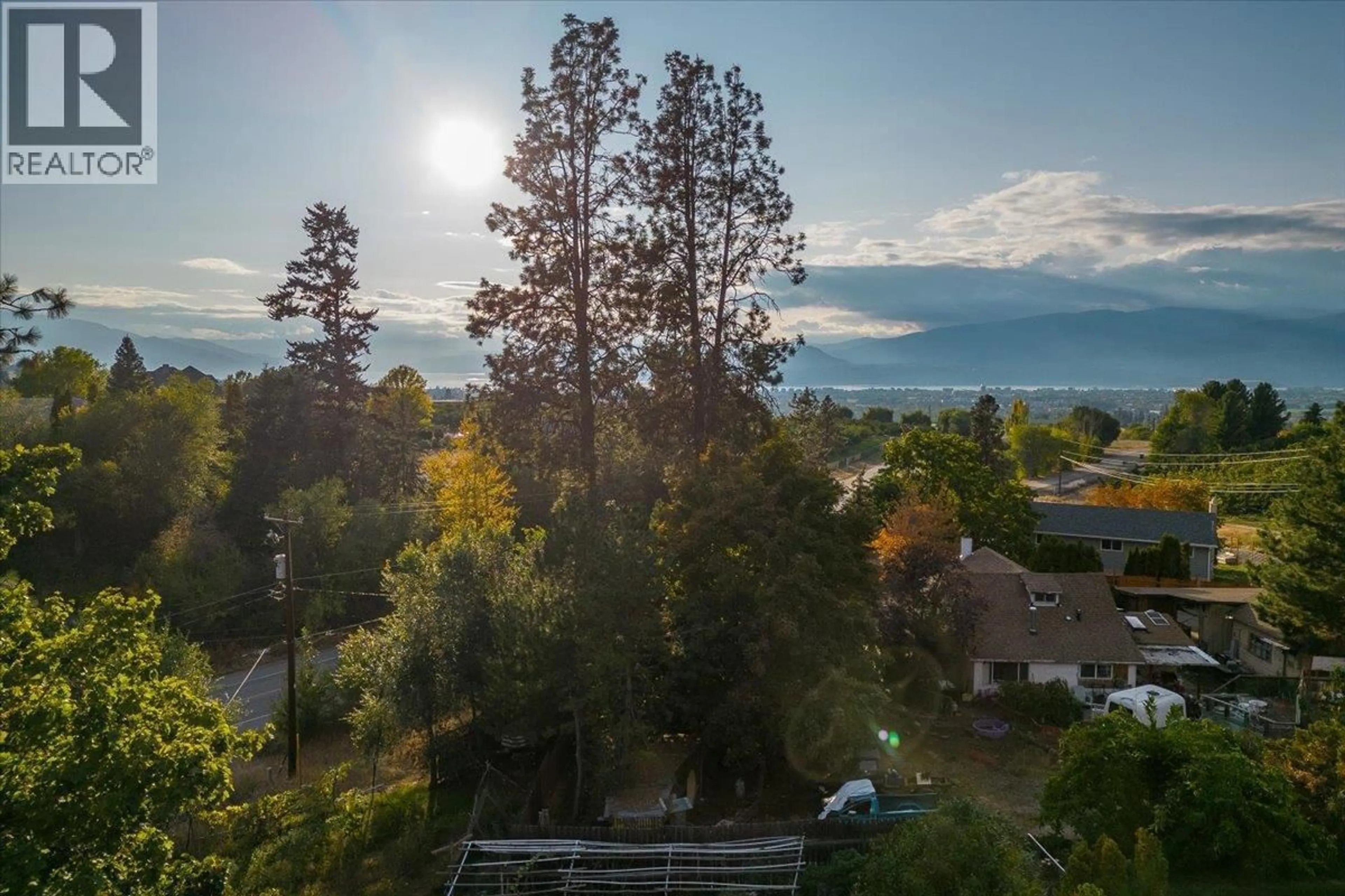 A pic from outside/outdoor area/front of a property/back of a property/a pic from drone, water/lake/river/ocean view for 3122 MCCULLOCH ROAD, Kelowna British Columbia V1W4G6