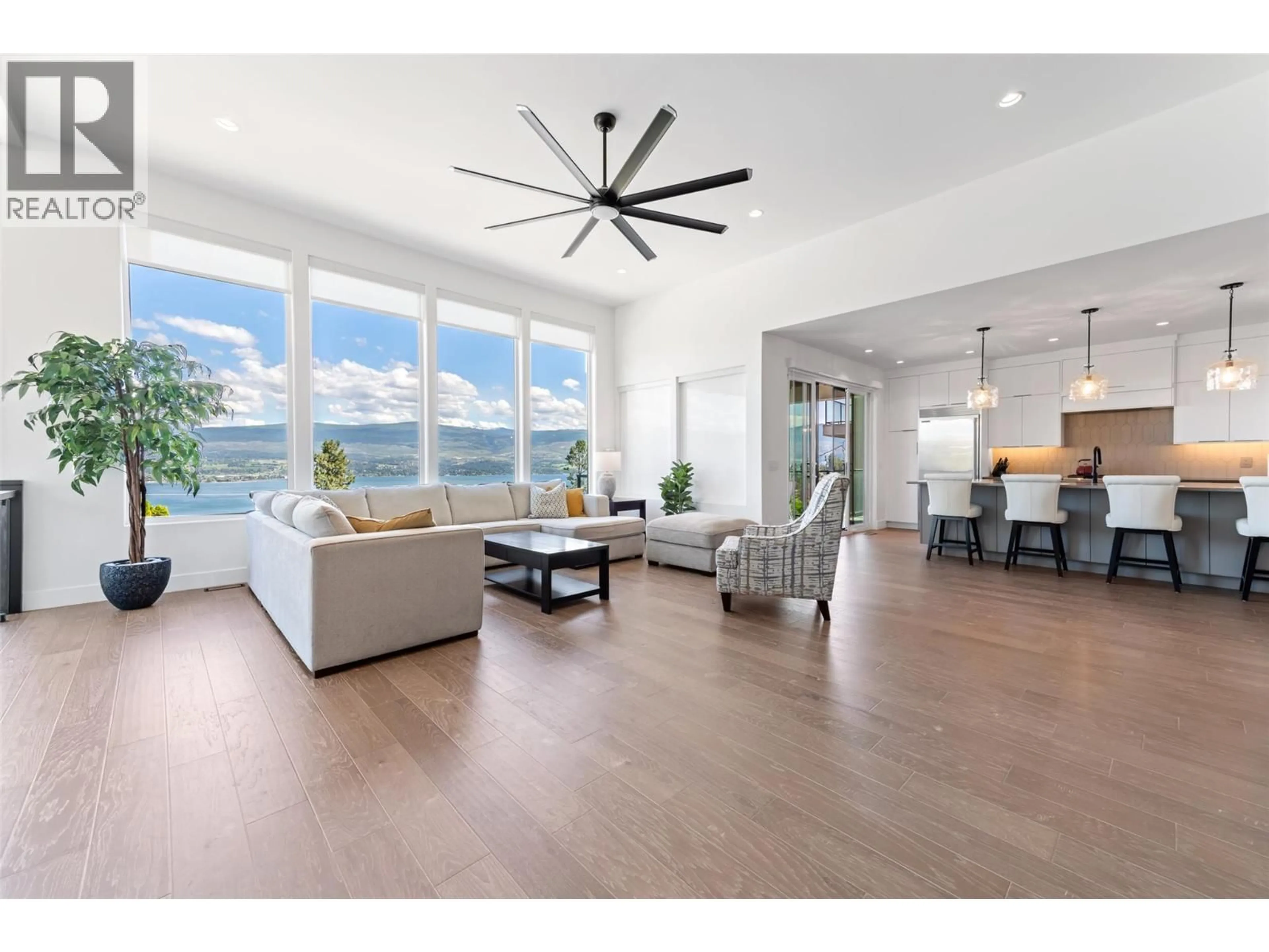 Living room with furniture, wood/laminate floor for 2672 LAKERIDGE ROAD, West Kelowna British Columbia V1Z1Y2