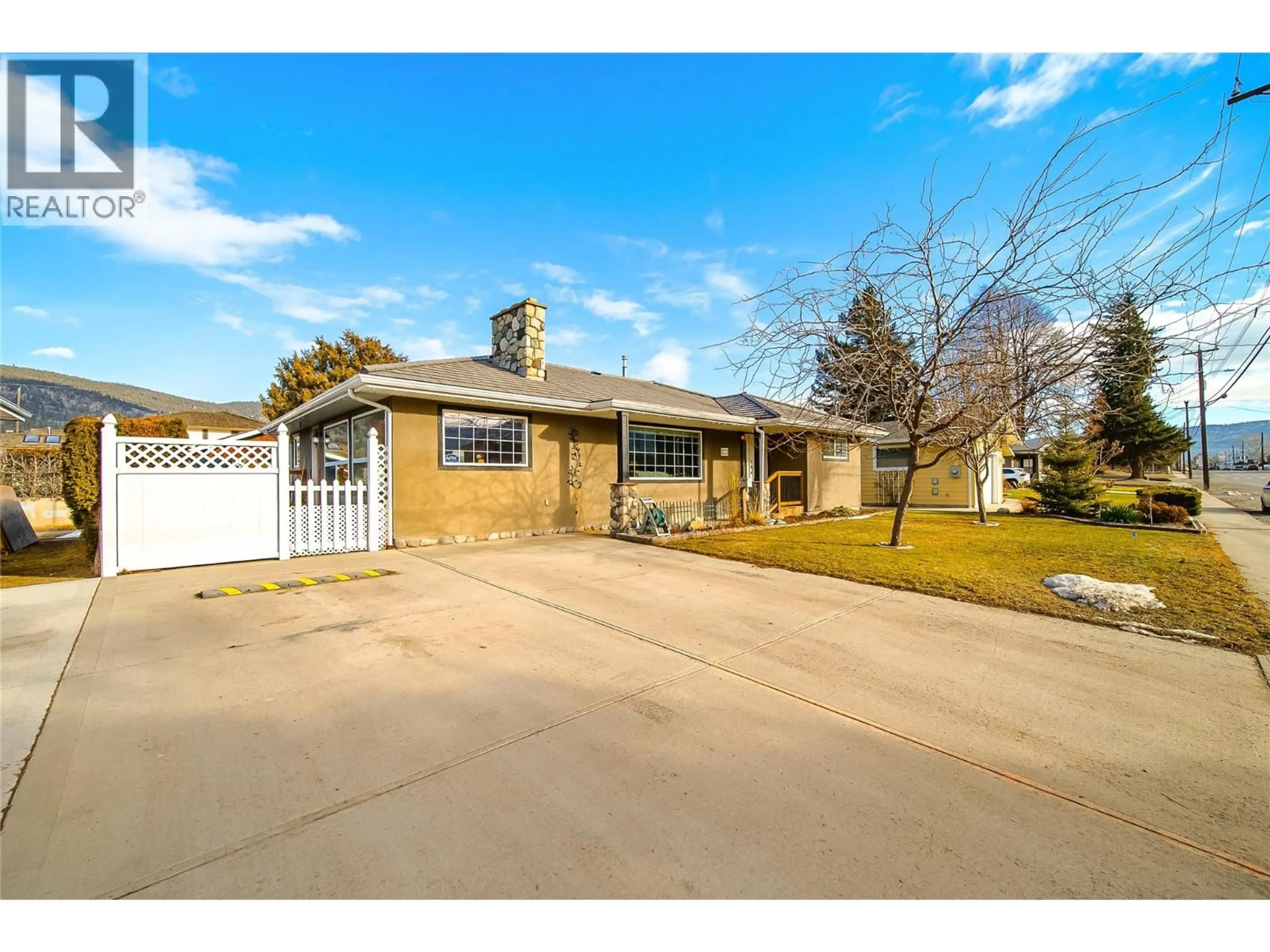 A pic from outside/outdoor area/front of a property/back of a property/a pic from drone, street for 1767 QUILCHENA AVENUE, Merritt British Columbia V1K1B8