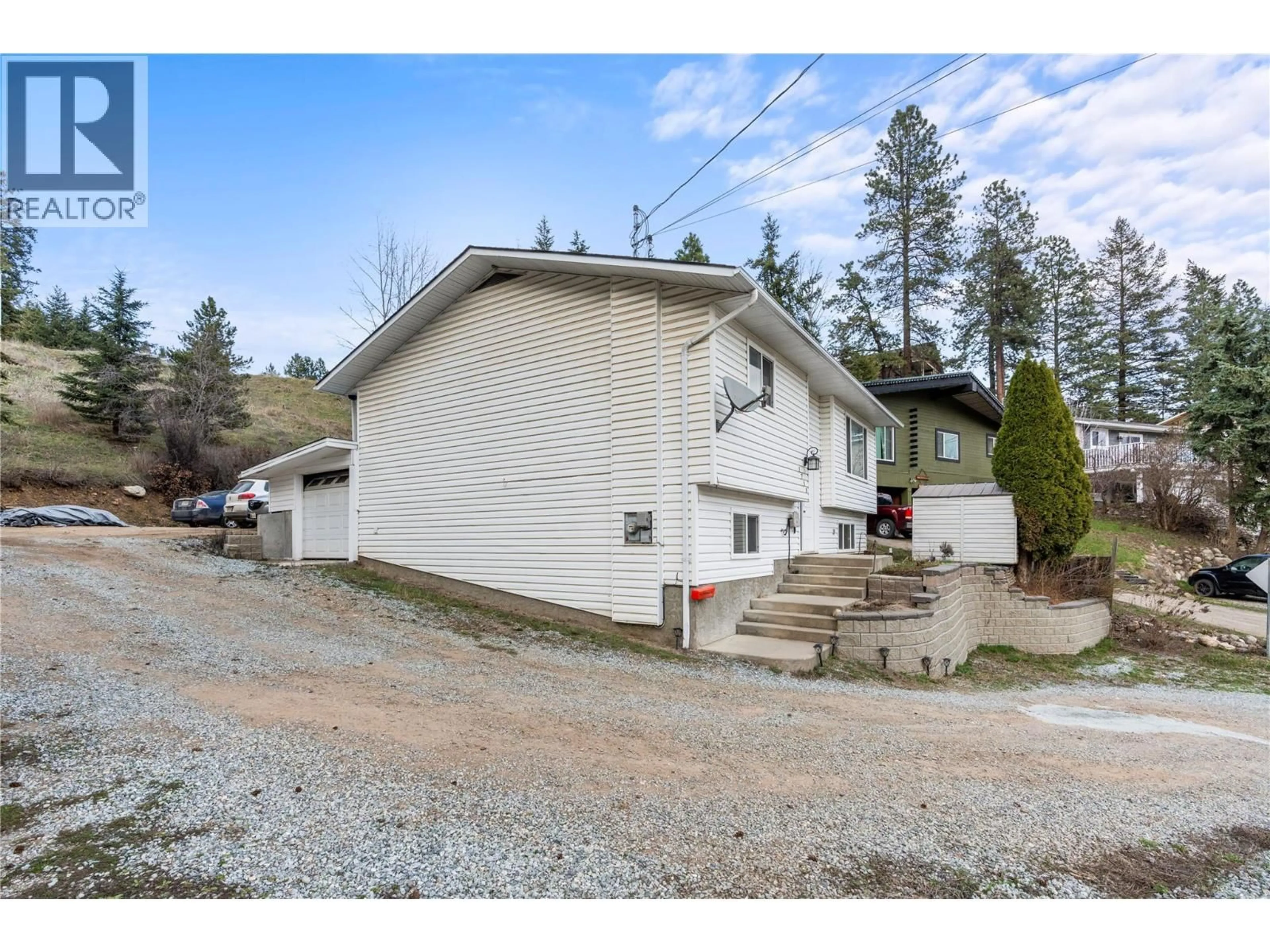 A pic from outside/outdoor area/front of a property/back of a property/a pic from drone, street for 1718 GRANDVIEW AVENUE, Lumby British Columbia V0E2G0