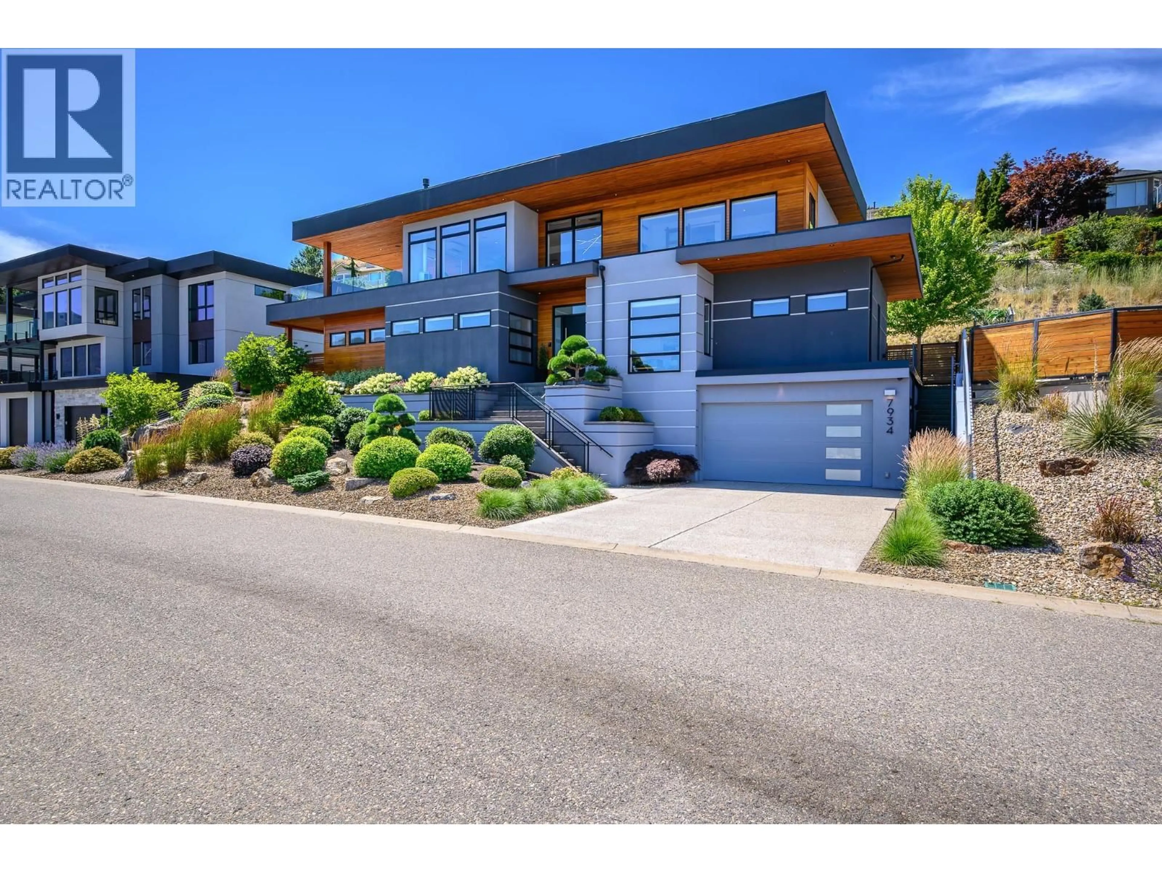 Home with brick exterior material, street for 7934 GRAYSTONE DRIVE, Coldstream British Columbia V1B4A9