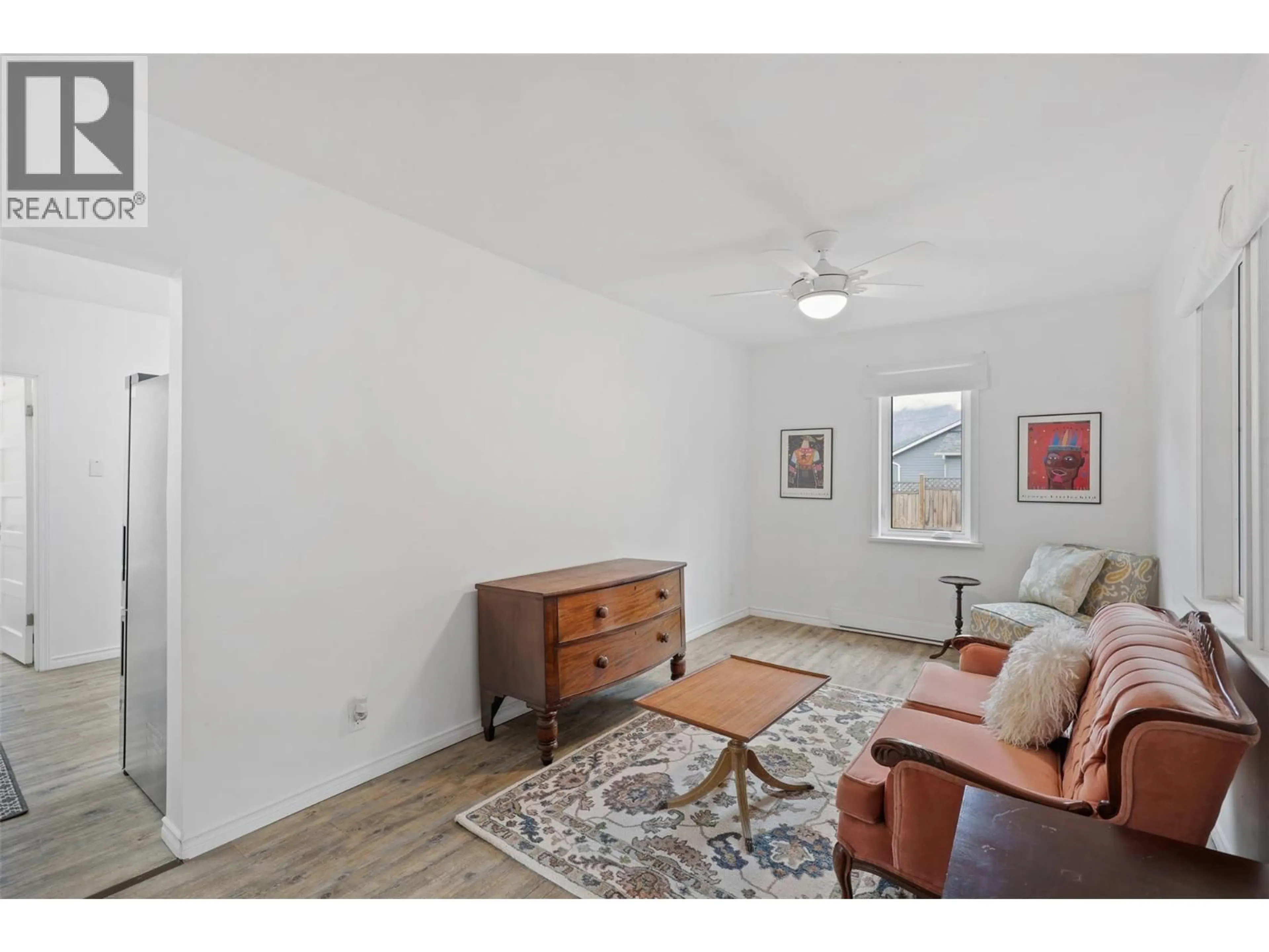 Living room with furniture, wood/laminate floor for 124 FRASER STREET, Lytton British Columbia V0K1Z0