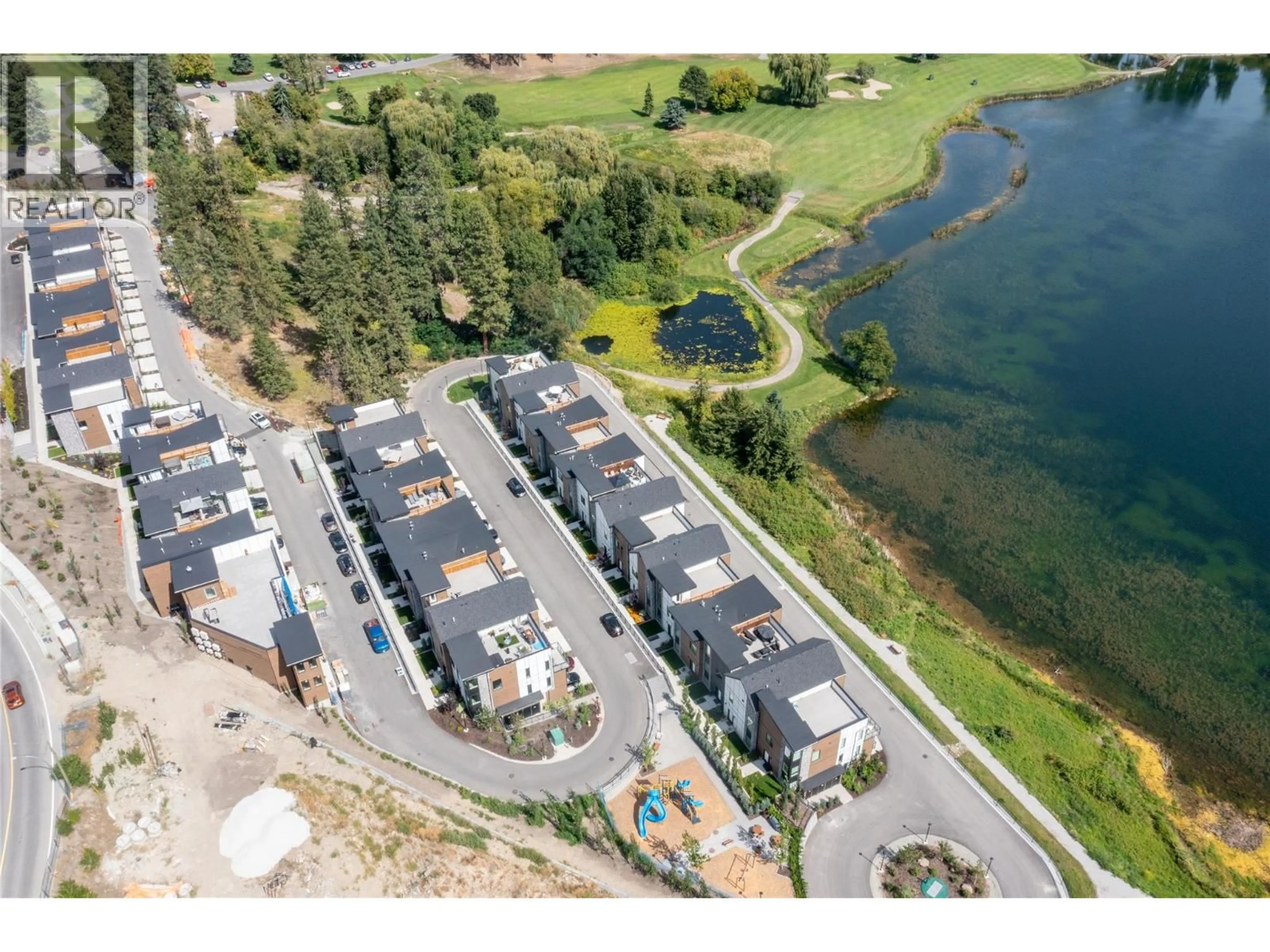 A pic from outside/outdoor area/front of a property/back of a property/a pic from drone, water/lake/river/ocean view for 502 - 2735 SHANNON LAKE ROAD, West Kelowna British Columbia V4T1V6
