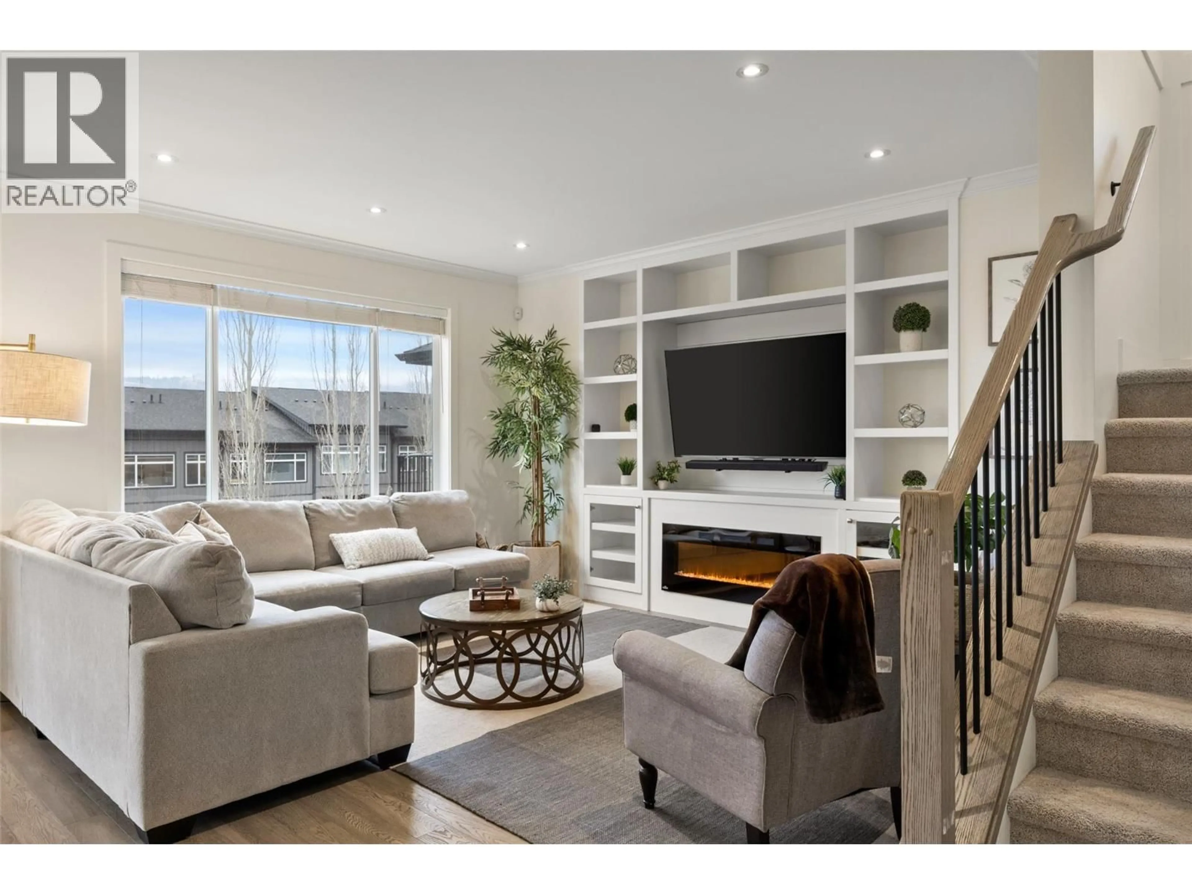 Living room with furniture, wood/laminate floor for 1553 EMERALD DRIVE, Kamloops British Columbia V2E0C4