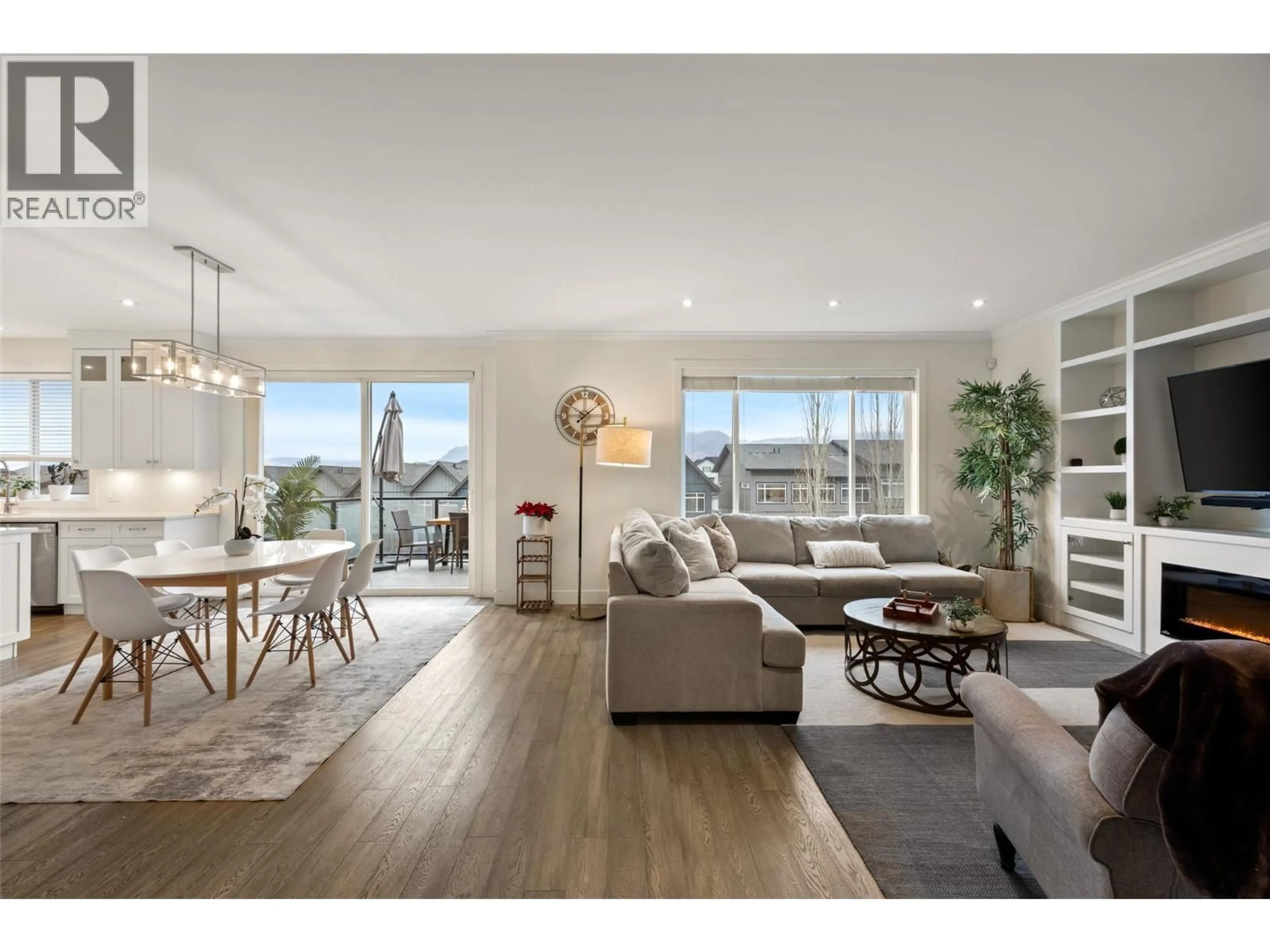 Living room with furniture, wood/laminate floor for 1553 EMERALD DRIVE, Kamloops British Columbia V2E0C4