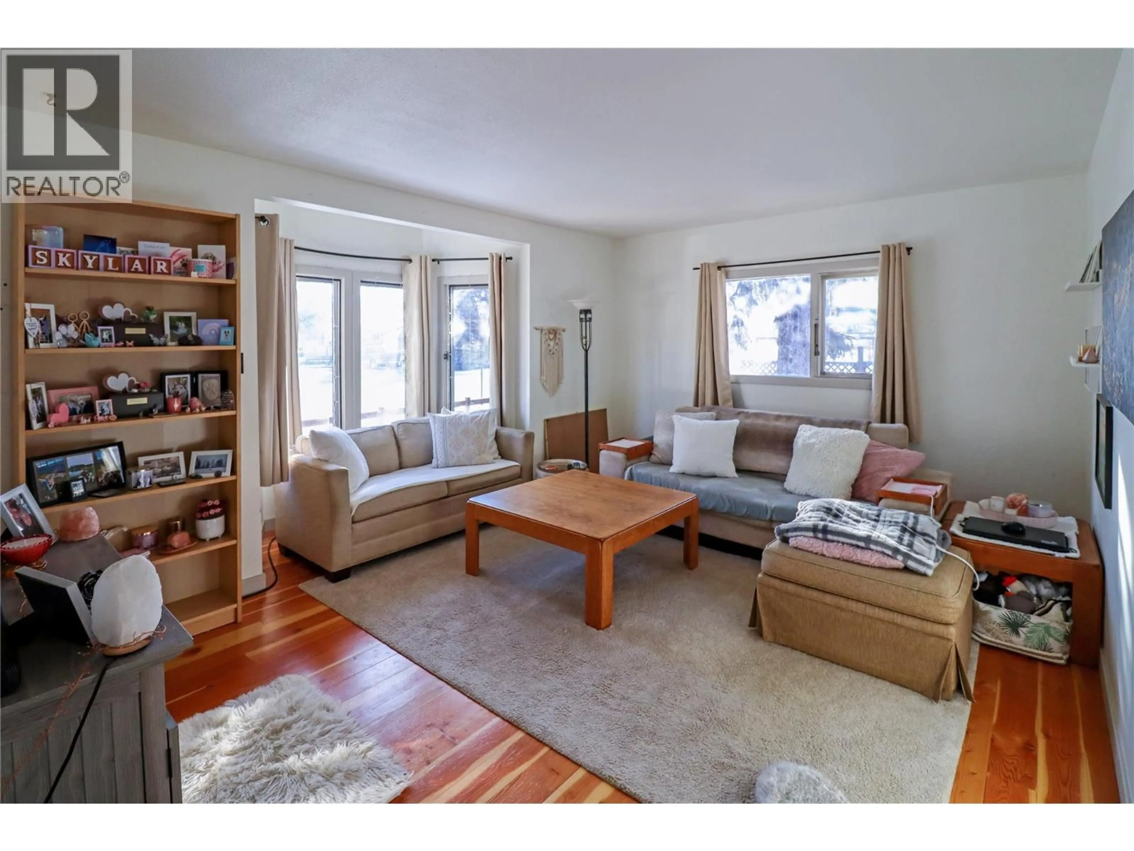 Living room with furniture, wood/laminate floor for 291 FENCHURCH AVENUE, Princeton British Columbia V0X1W0