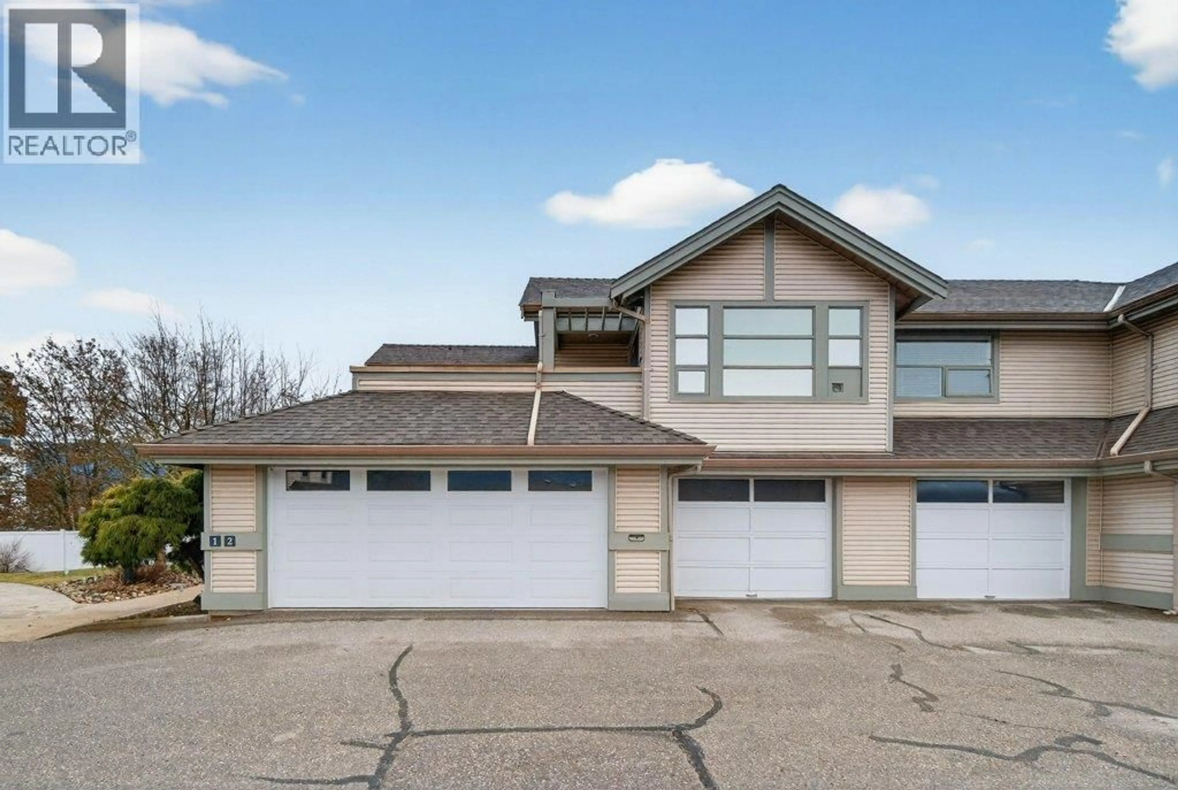 Home with vinyl exterior material, street for 2 - 111 HARBOURFRONT DRIVE NORTHWEST, Salmon Arm British Columbia V1E1A3