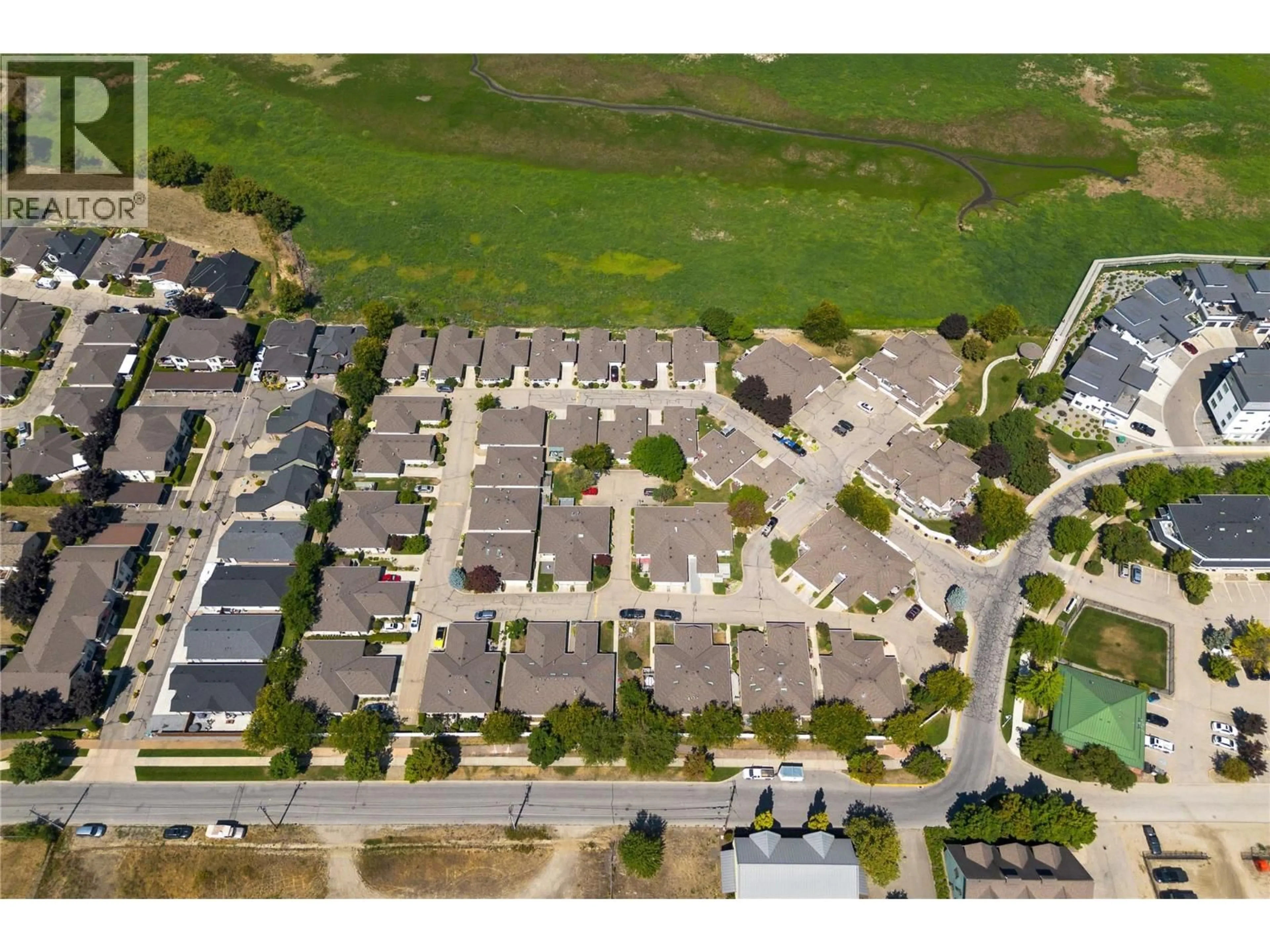 A pic from outside/outdoor area/front of a property/back of a property/a pic from drone, street for 2 - 111 HARBOURFRONT DRIVE NORTHWEST, Salmon Arm British Columbia V1E1A3