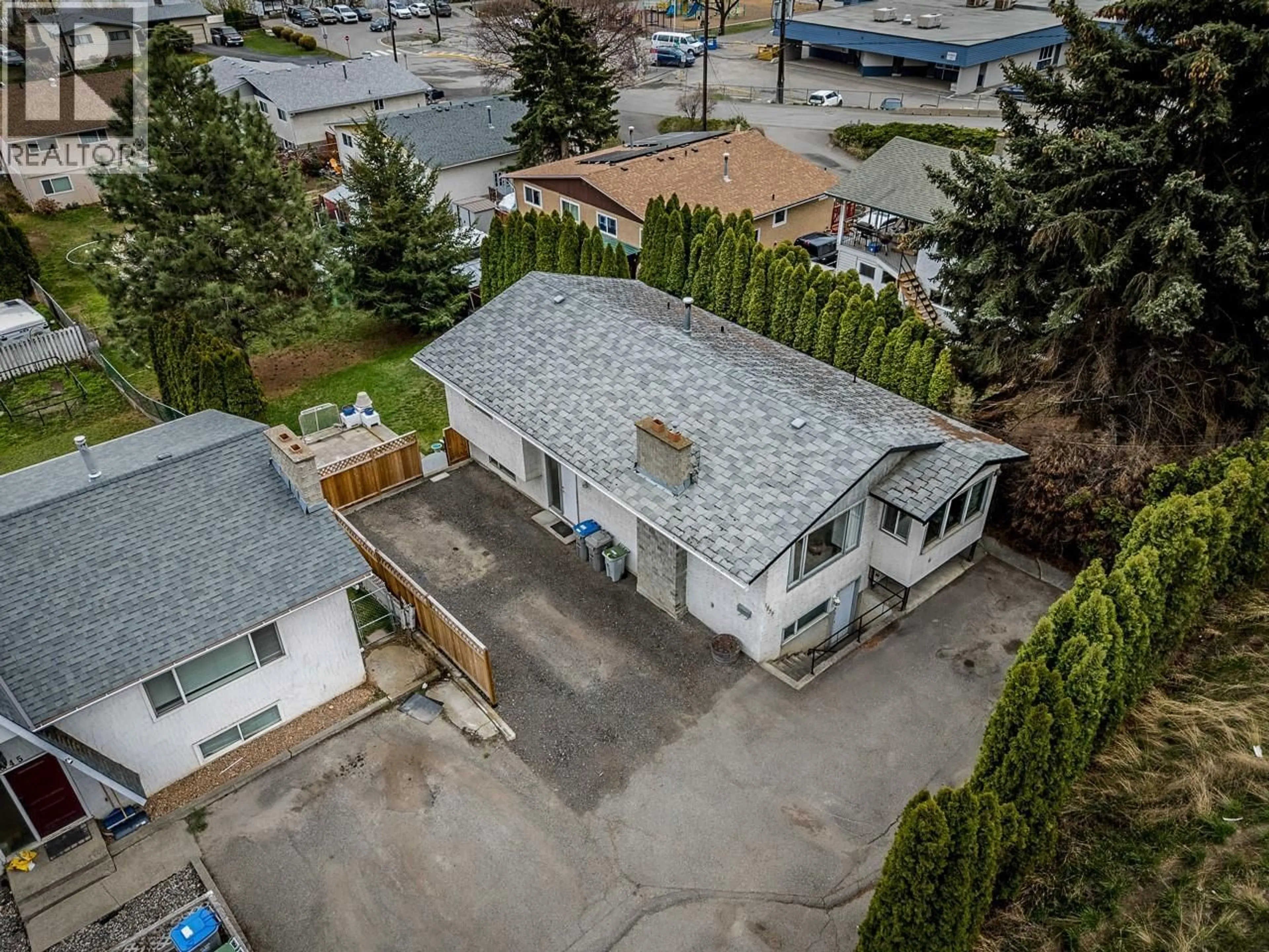 A pic from outside/outdoor area/front of a property/back of a property/a pic from drone, street for 1835 WESTSYDE ROAD, Kamloops British Columbia V2B7B9