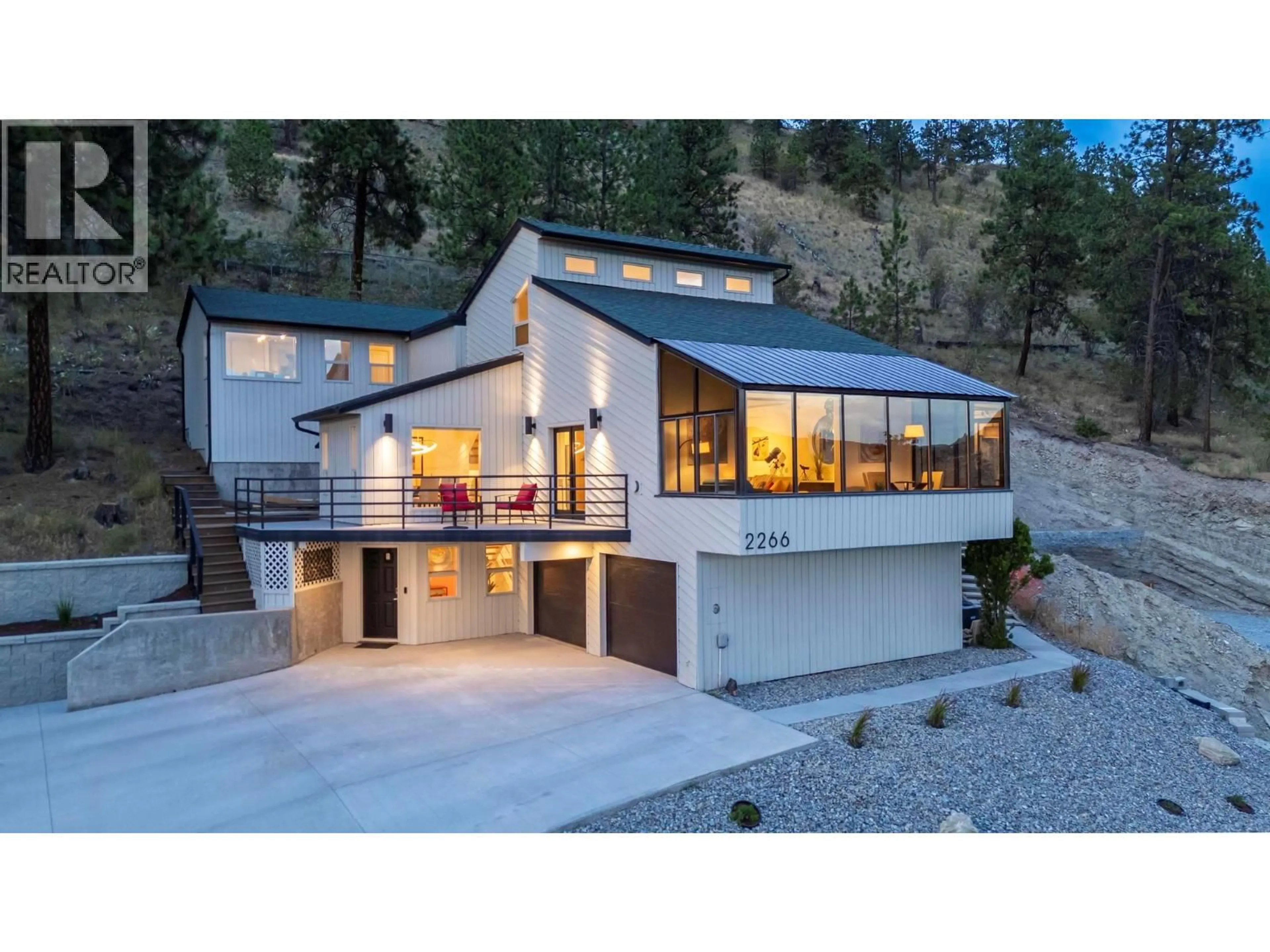 Home with vinyl exterior material, mountain view for 2266 OMINECA PLACE, Kelowna British Columbia V1V1H7