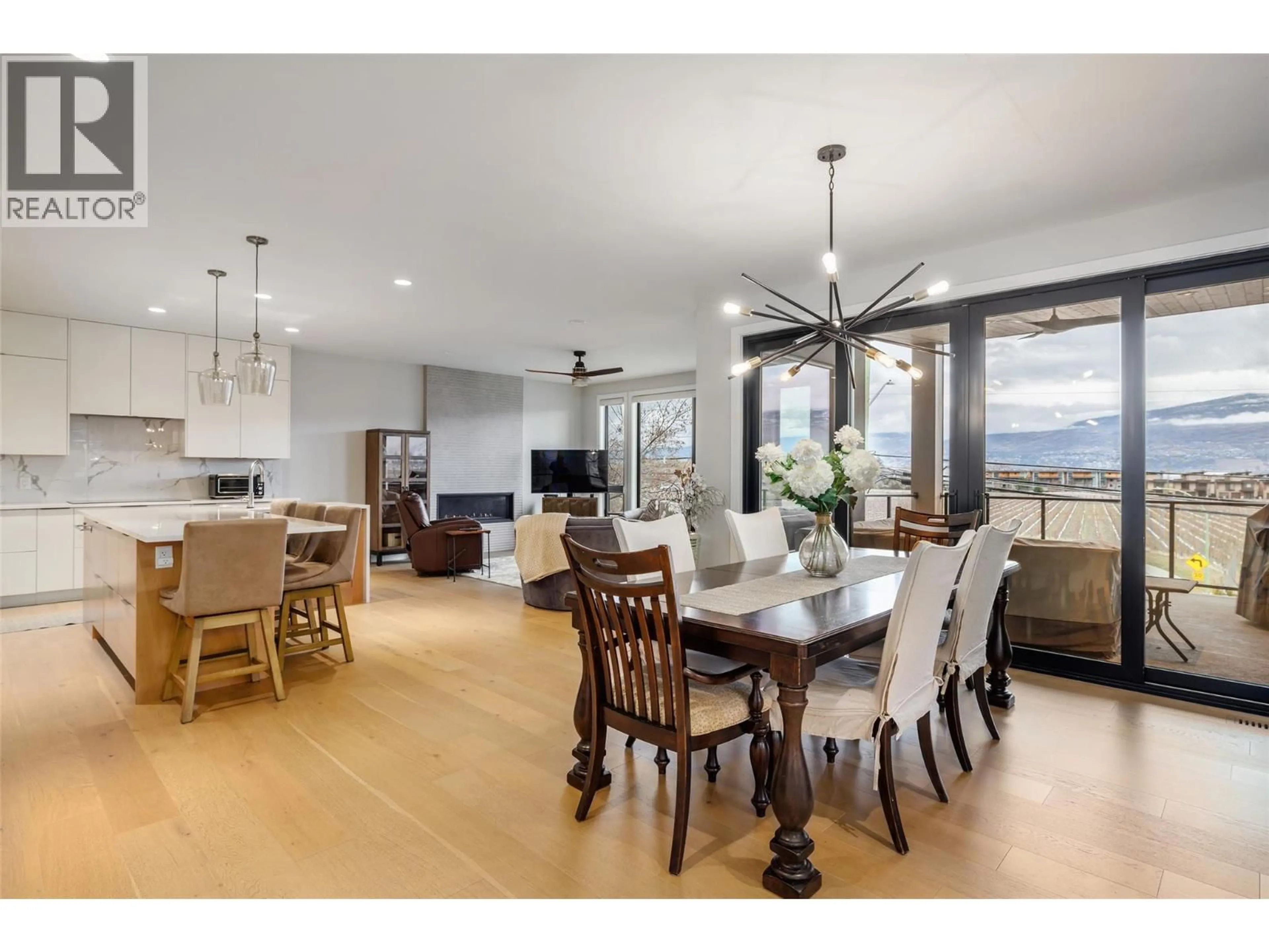 Open concept kitchen, wood/laminate floor for 3639 APPLE WAY BOULEVARD, West Kelowna British Columbia V4t1Y5