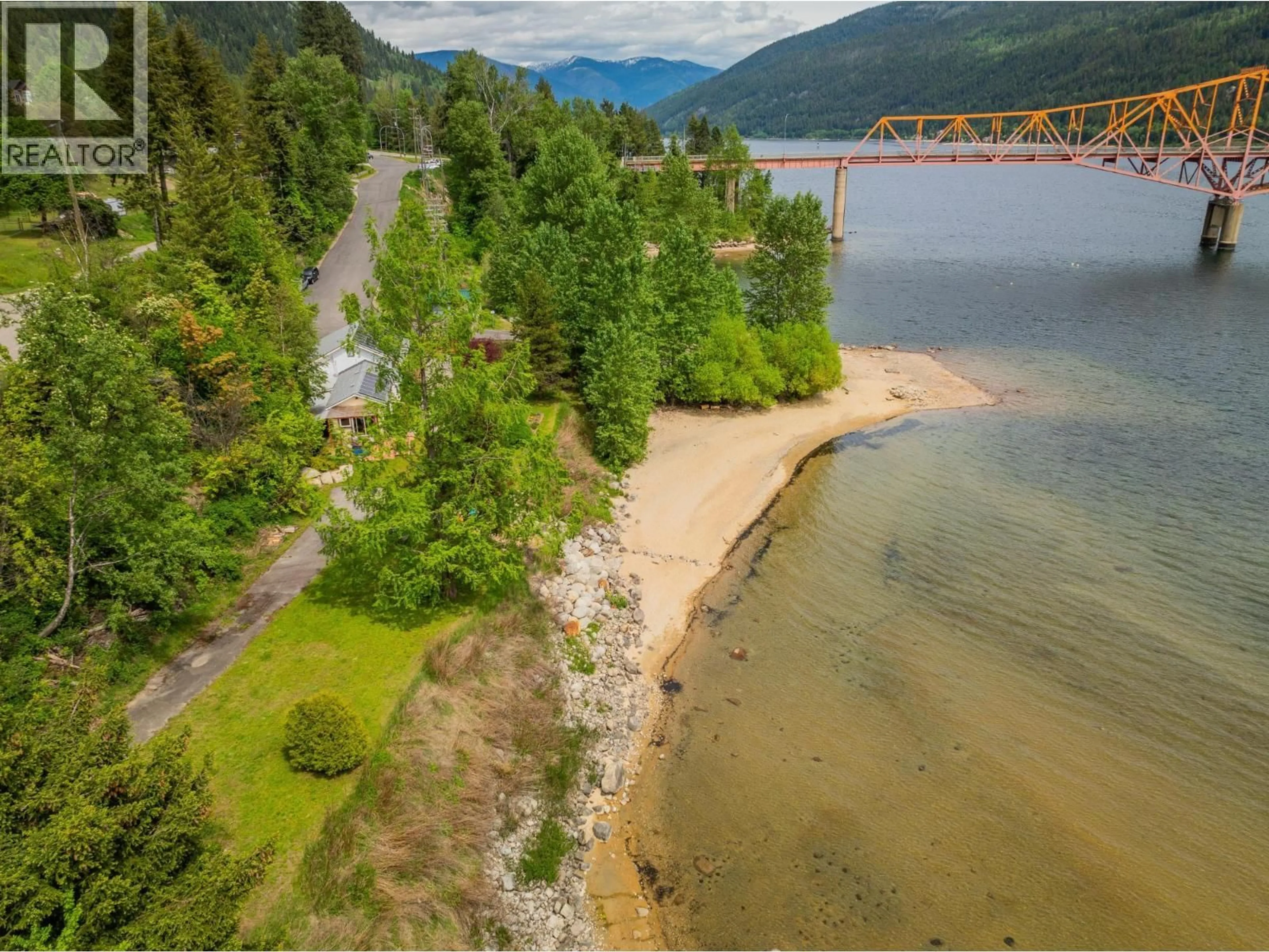 A pic from outside/outdoor area/front of a property/back of a property/a pic from drone, water/lake/river/ocean view for 606 JORGENSEN ROAD, Nelson British Columbia V1L6M6