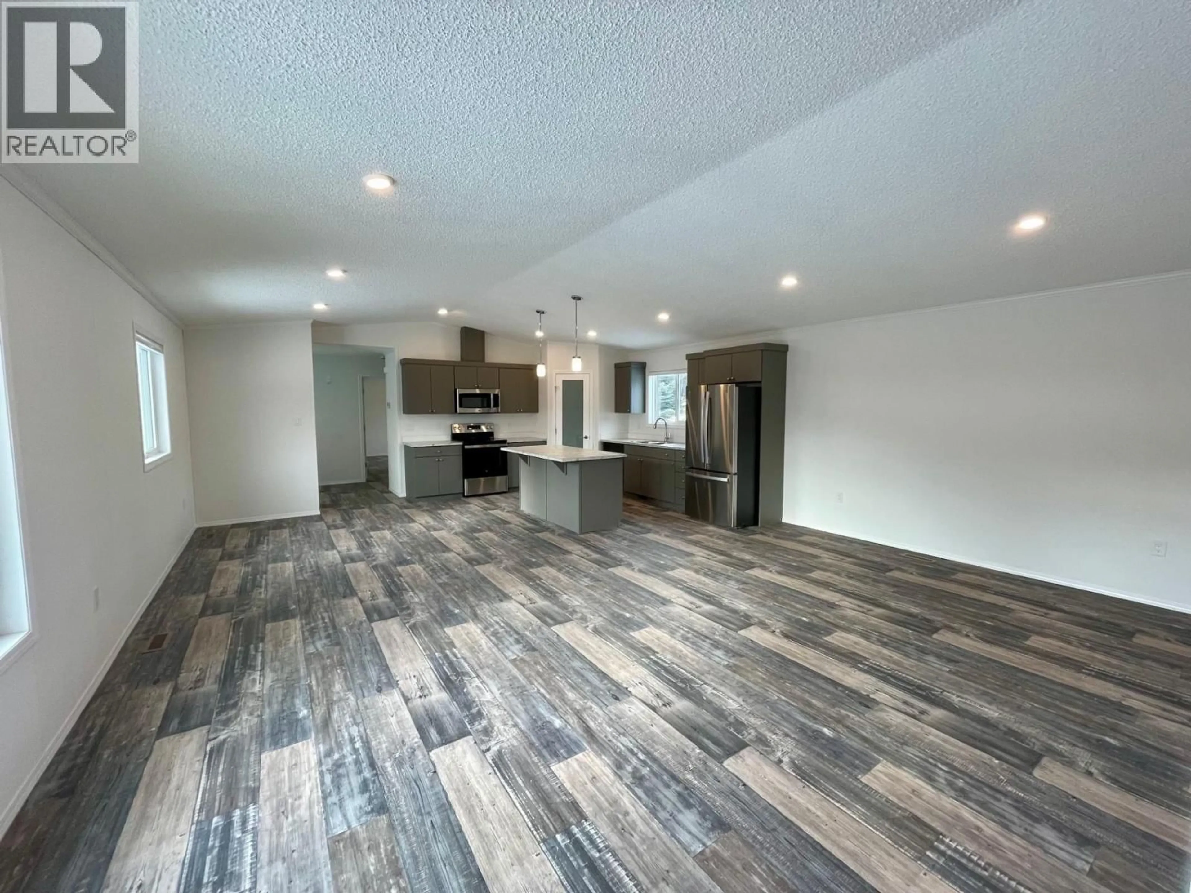 Open concept kitchen, wood/laminate floor for 34 - 6272 LOWER ELK VALLEY ROAD, Sparwood British Columbia V0B2G3