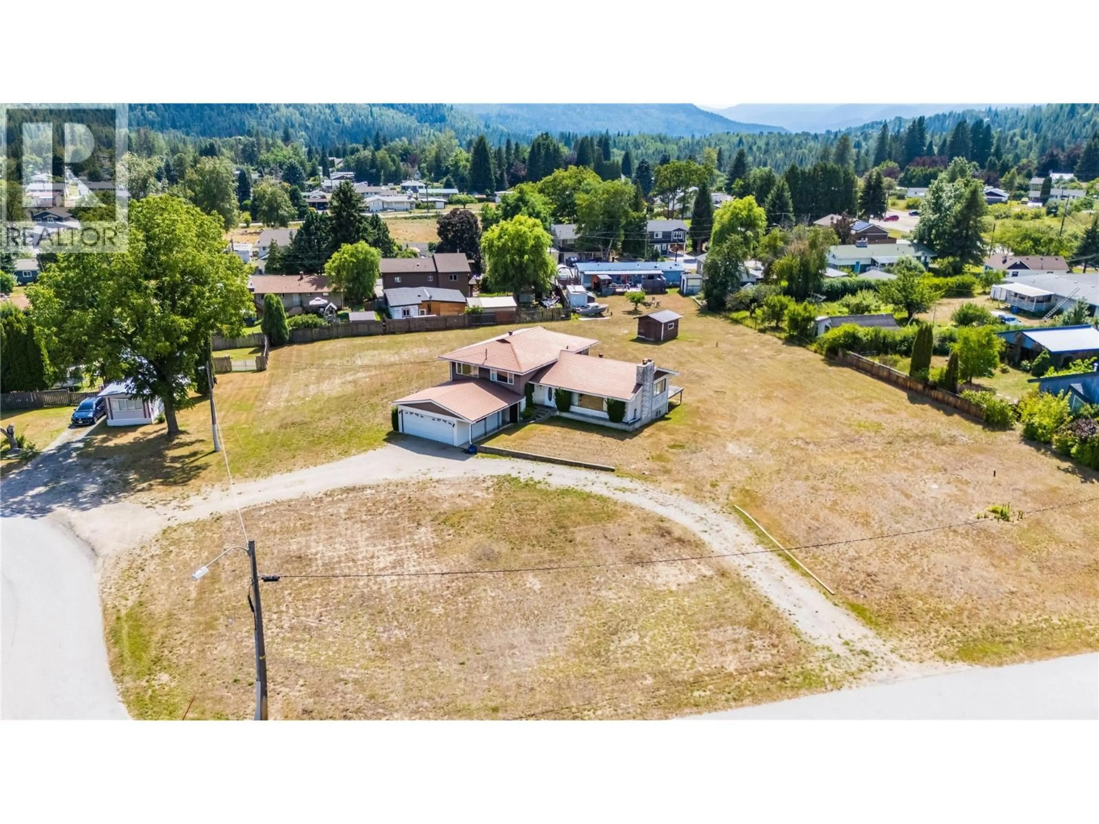 A pic from outside/outdoor area/front of a property/back of a property/a pic from drone, mountain view for 412 104TH STREET, Castlegar British Columbia V1N3G5