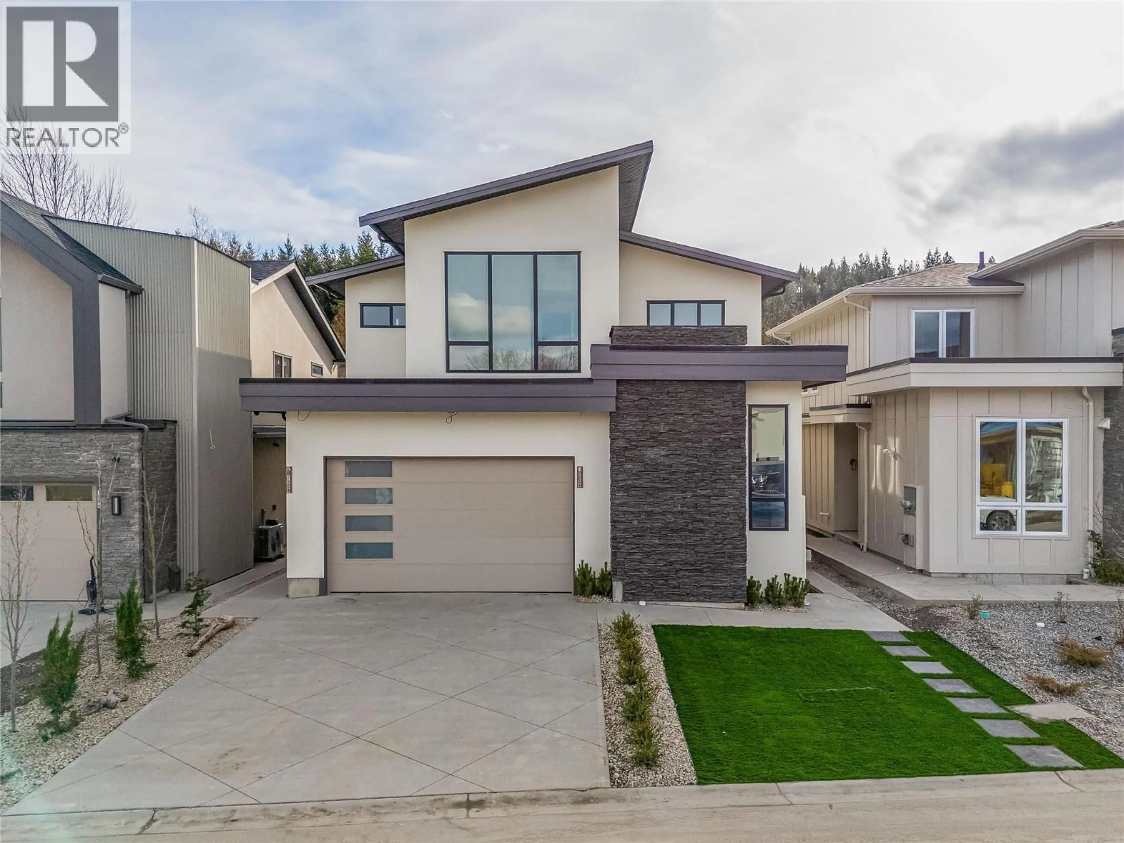 Home with brick exterior material, street for 1008 BULL CRESCENT, Kelowna British Columbia V1W0E6