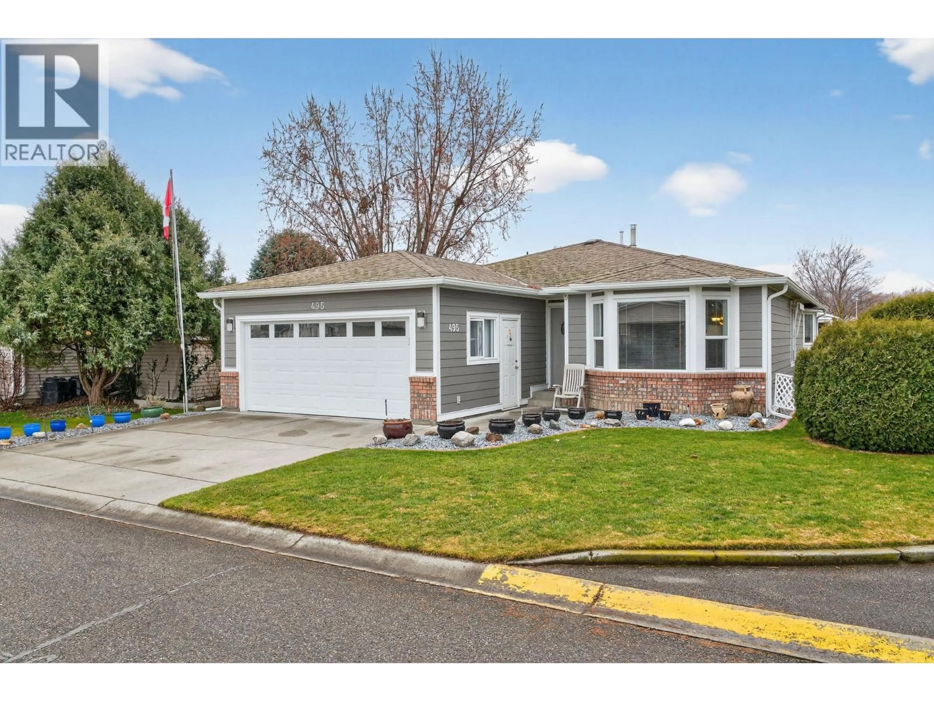 Home with vinyl exterior material, street for 495 - 1255 RAYMER AVENUE, Kelowna British Columbia V1W3S3