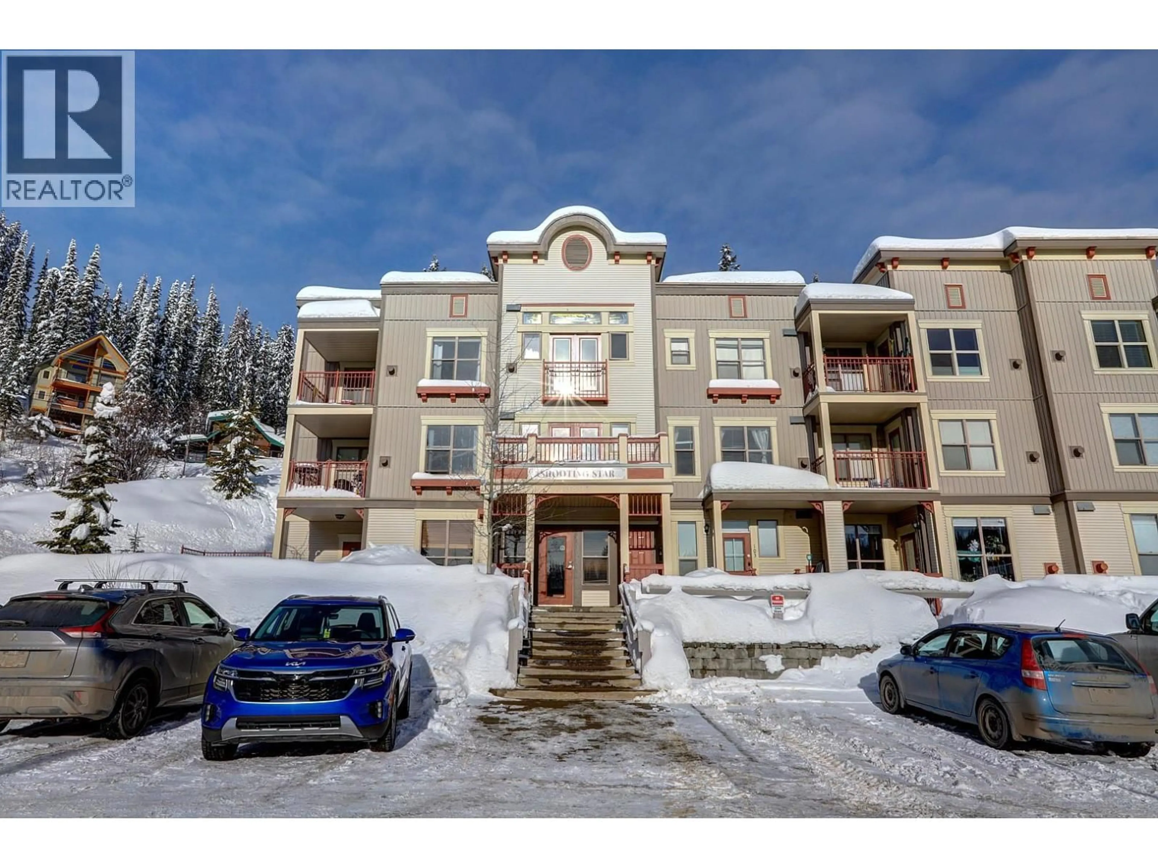 A pic from outside/outdoor area/front of a property/back of a property/a pic from drone, mountain view for 306 - 9802 SILVER STAR ROAD, Silver Star British Columbia V1B3W9