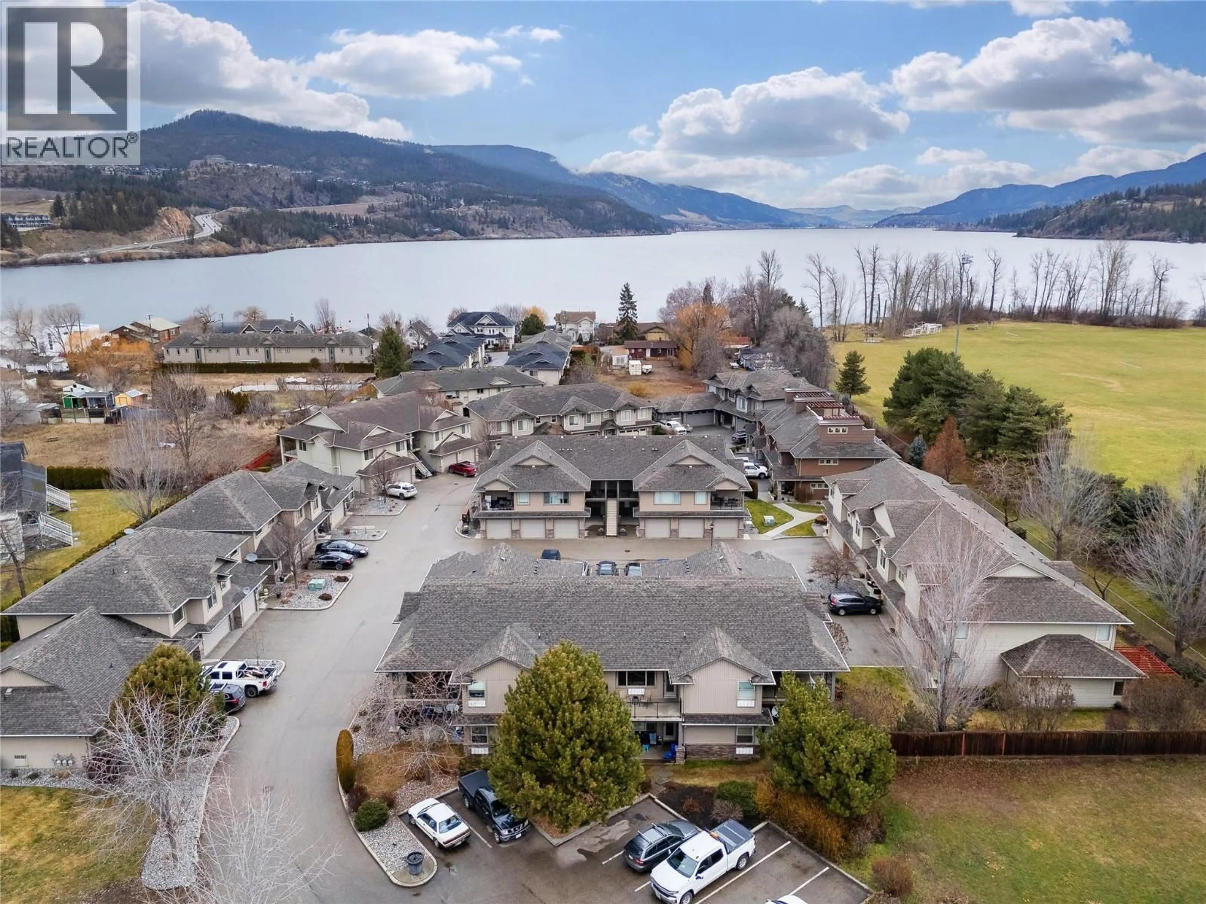 A pic from outside/outdoor area/front of a property/back of a property/a pic from drone, water/lake/river/ocean view for 601 - 3350 WOODSDALE ROAD, Lake Country British Columbia V4V2R7