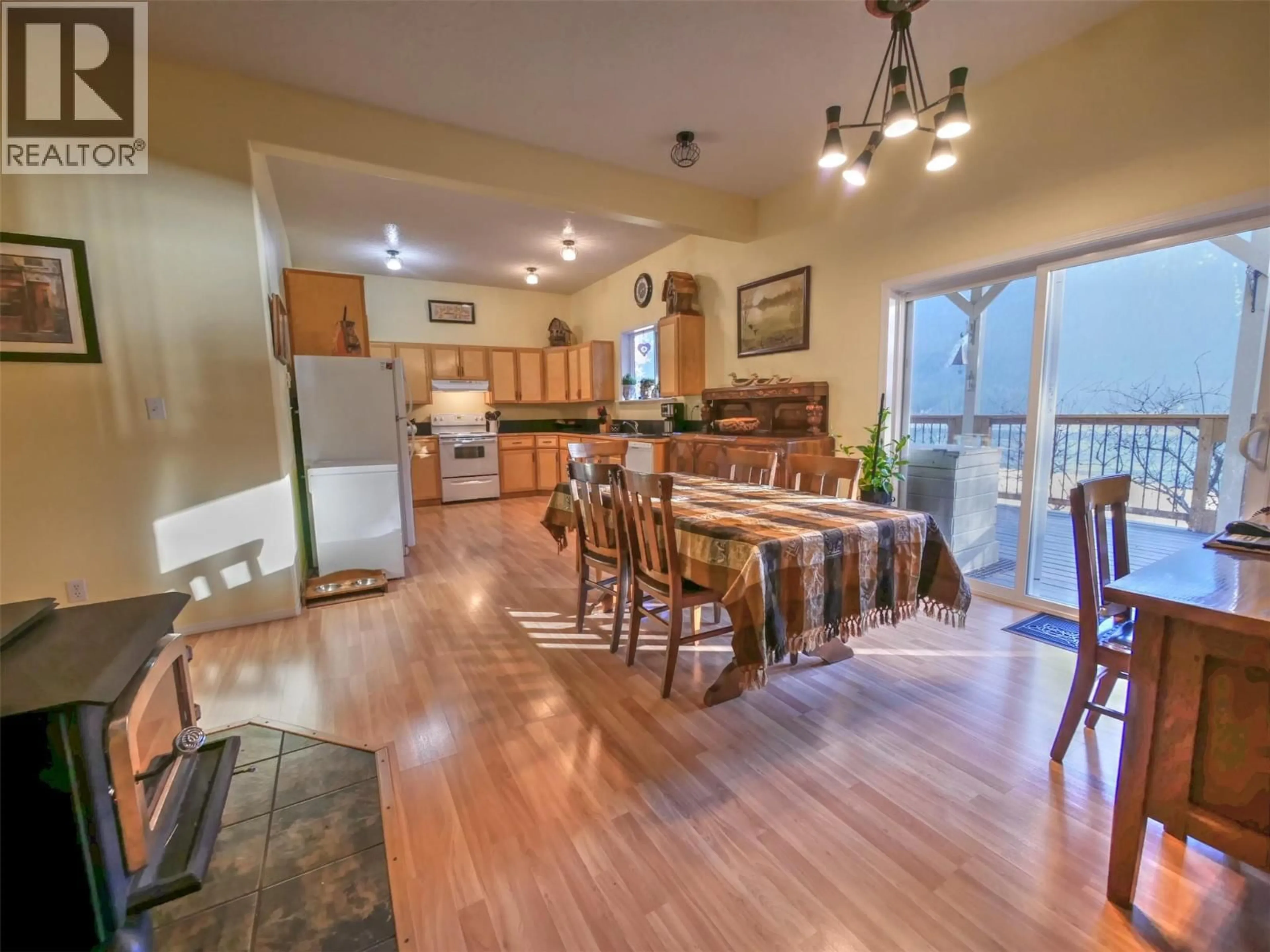 Open concept kitchen, wood/laminate floor for 240 ARROW PARK DEMARS ROAD, Nakusp British Columbia V0G1R1