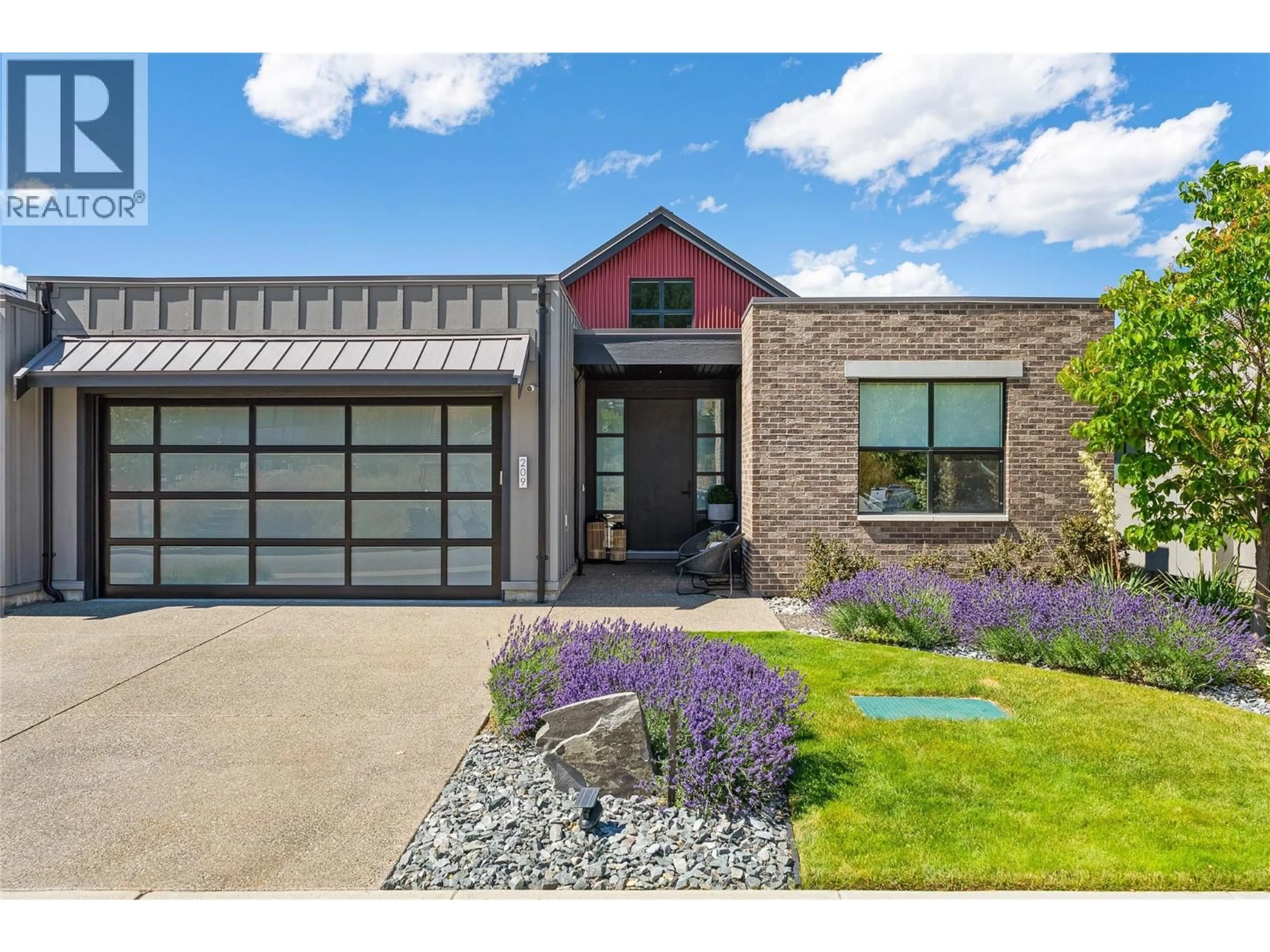 Home with brick exterior material, street for 209 ASHCROFT PLACE, Vernon British Columbia V1H2M1