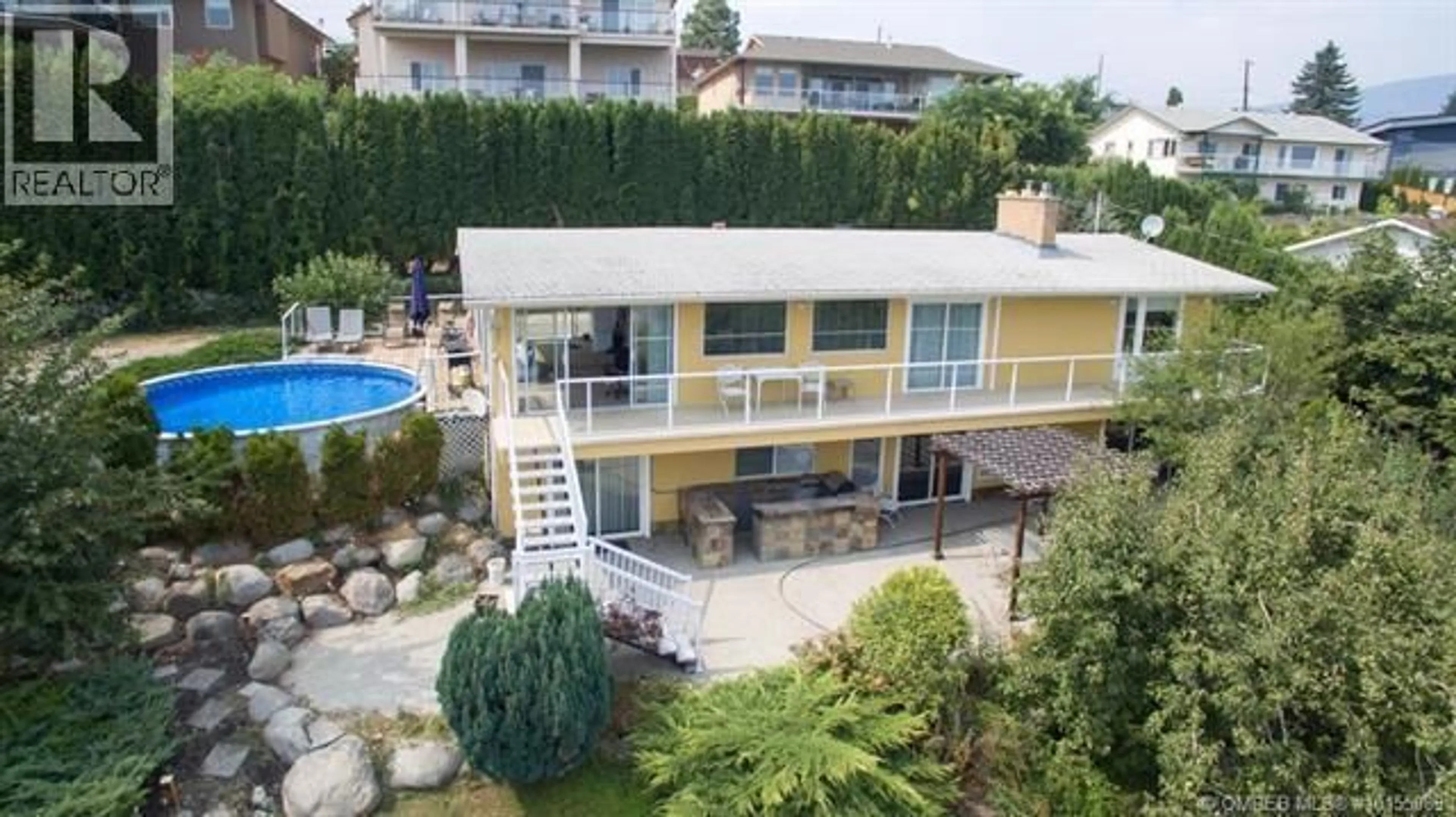 A pic from outside/outdoor area/front of a property/back of a property/a pic from drone, unknown for 3940 ANGUS DRIVE, West Kelowna British Columbia V4T2K1