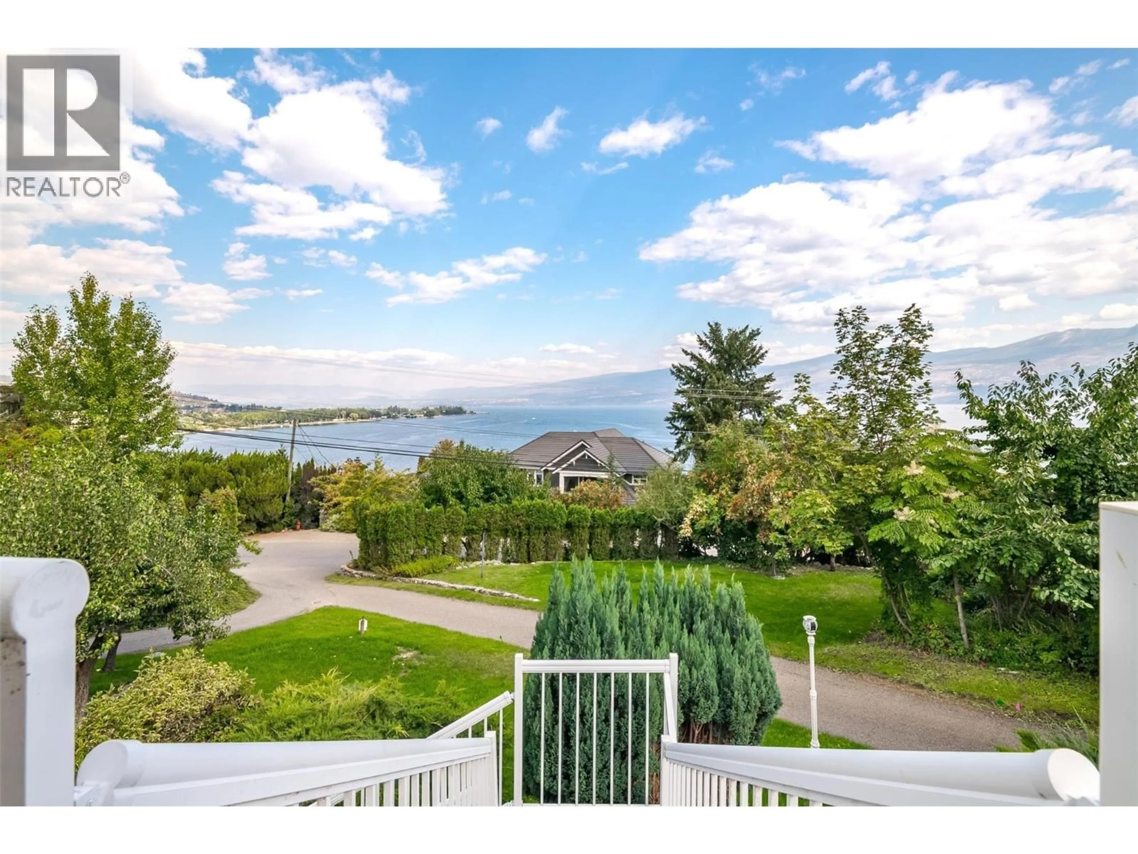 A pic from outside/outdoor area/front of a property/back of a property/a pic from drone, water/lake/river/ocean view for 3940 ANGUS DRIVE, West Kelowna British Columbia V4T2K1