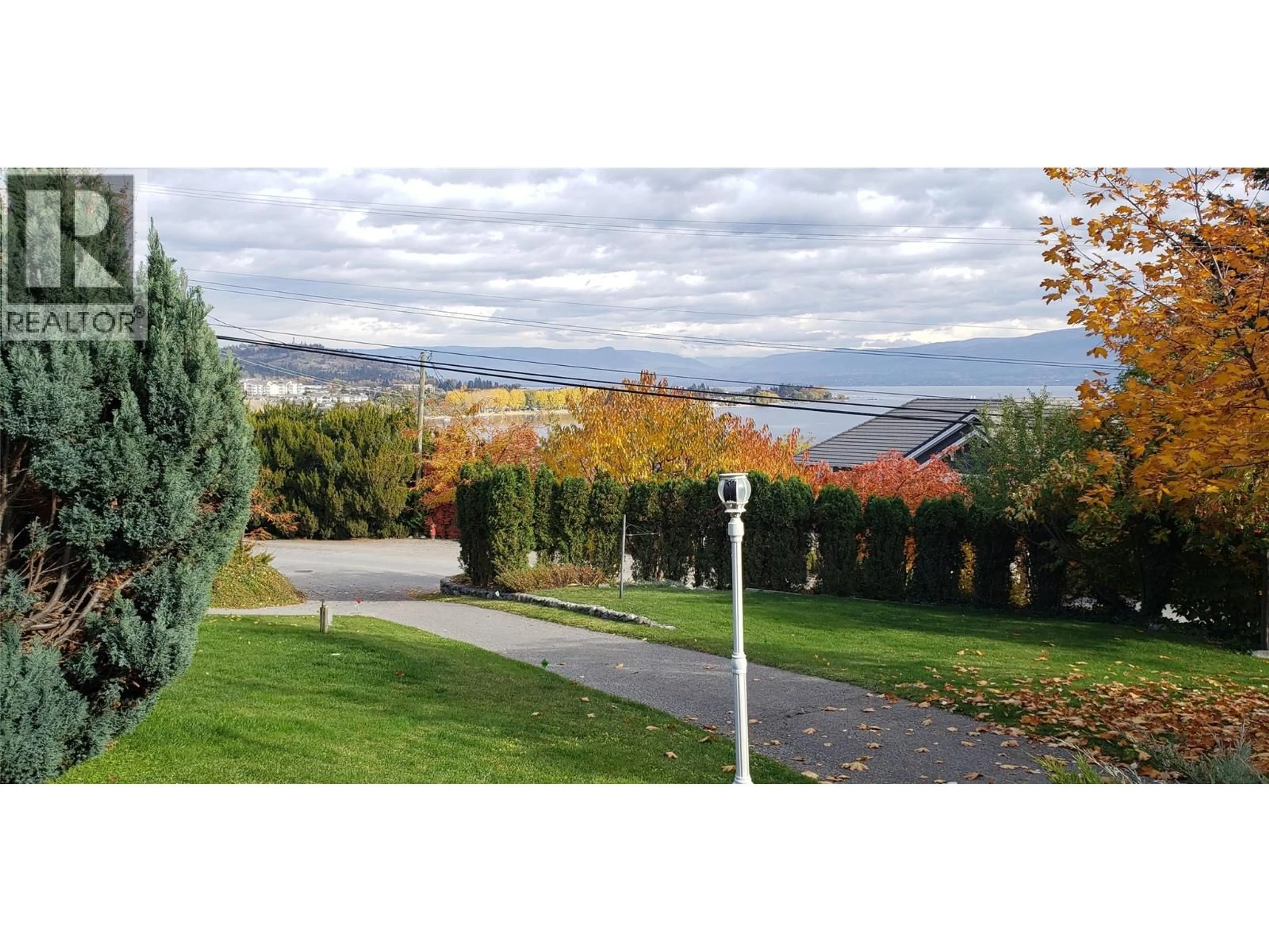 A pic from outside/outdoor area/front of a property/back of a property/a pic from drone, mountain view for 3940 ANGUS DRIVE, West Kelowna British Columbia V4T2K1