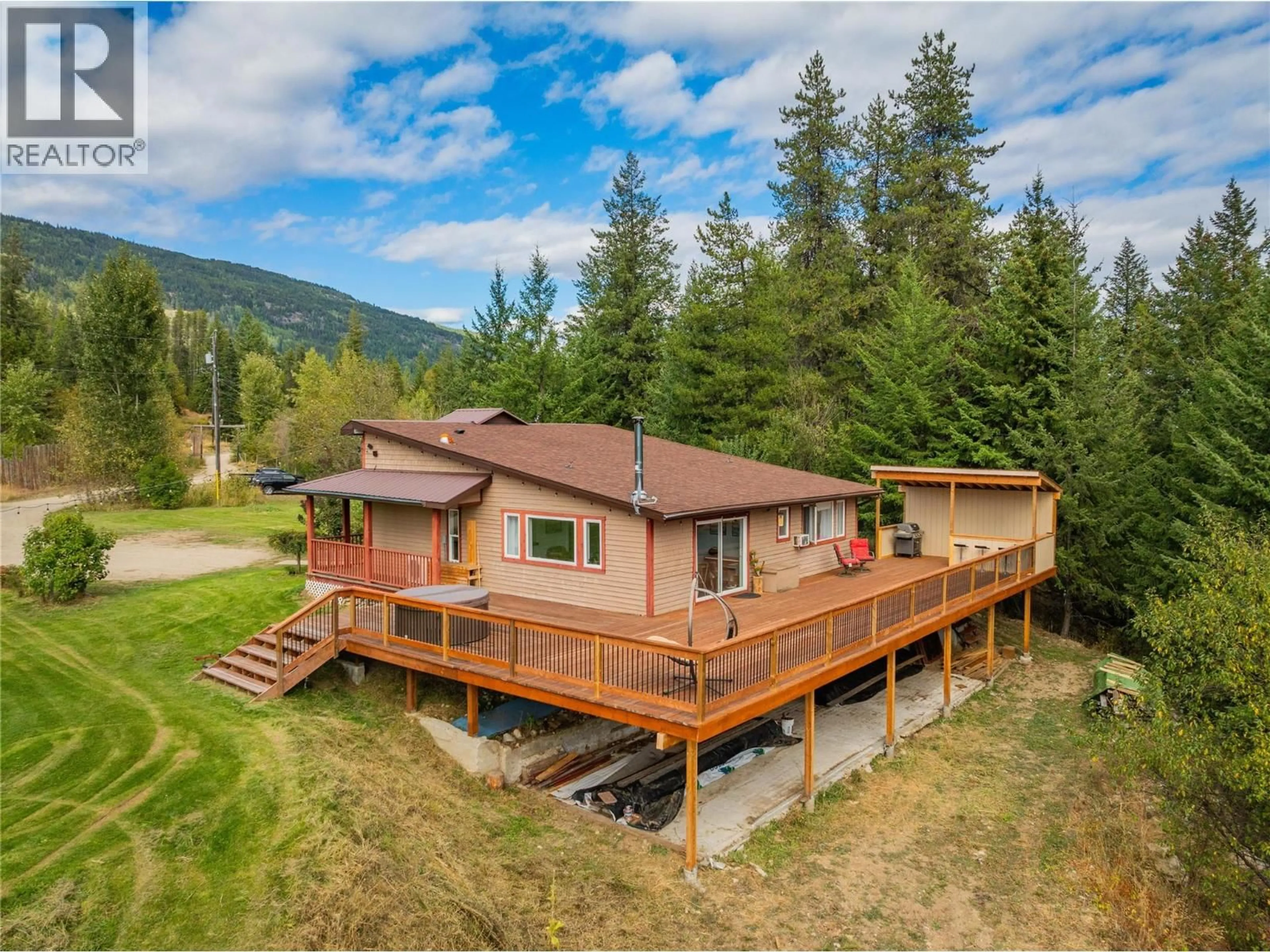 A pic from outside/outdoor area/front of a property/back of a property/a pic from drone, mountain view for 2396 NAULT ROAD, Castlegar British Columbia V1N4T5