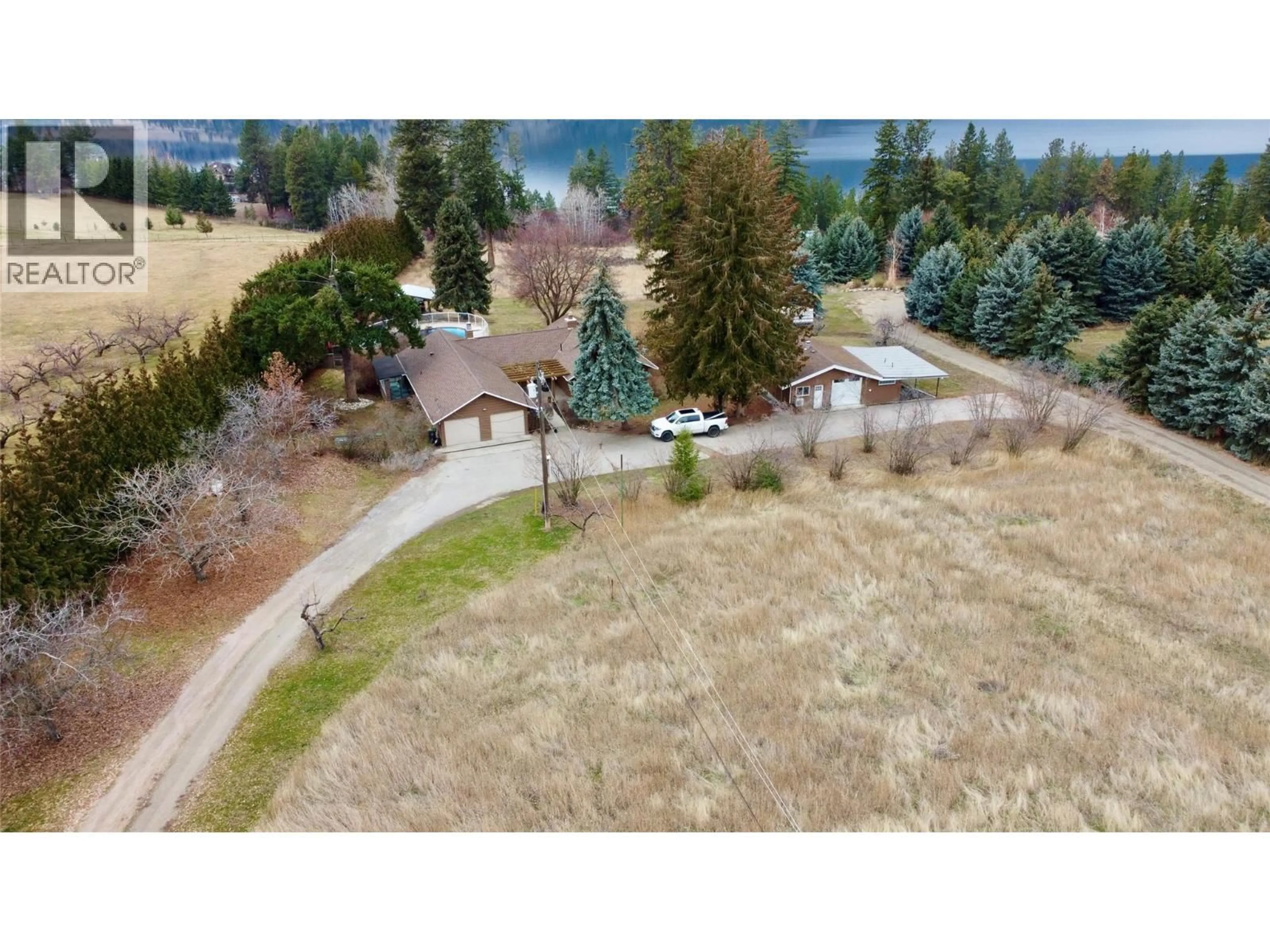 A pic from outside/outdoor area/front of a property/back of a property/a pic from drone, forest/trees view for 12914 OYAMA ROAD, Lake Country British Columbia V4V2A7