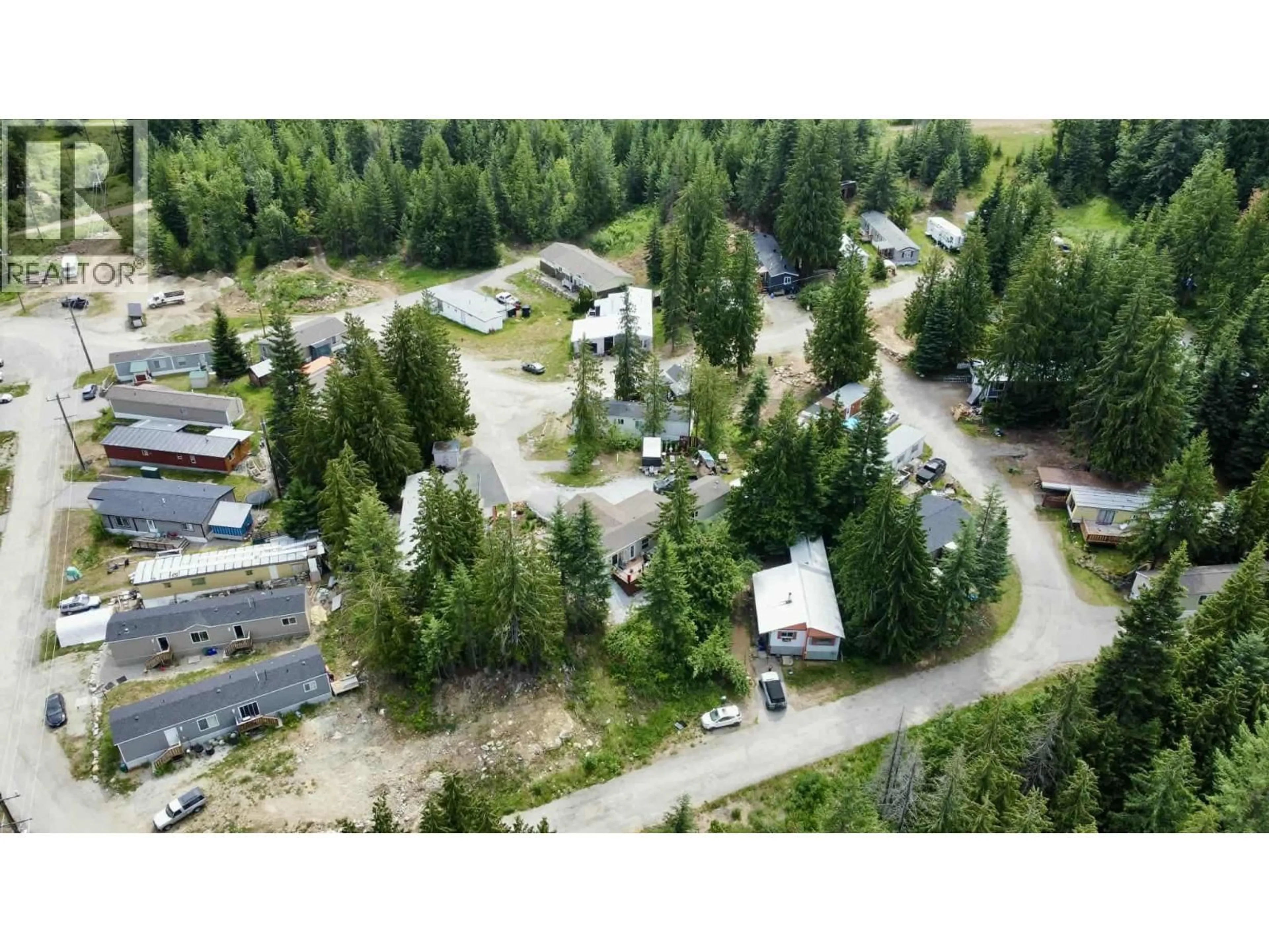A pic from outside/outdoor area/front of a property/back of a property/a pic from drone, forest/trees view for 29 - 891 MONTE VISTA DRIVE, Rossland British Columbia V0G1Y0