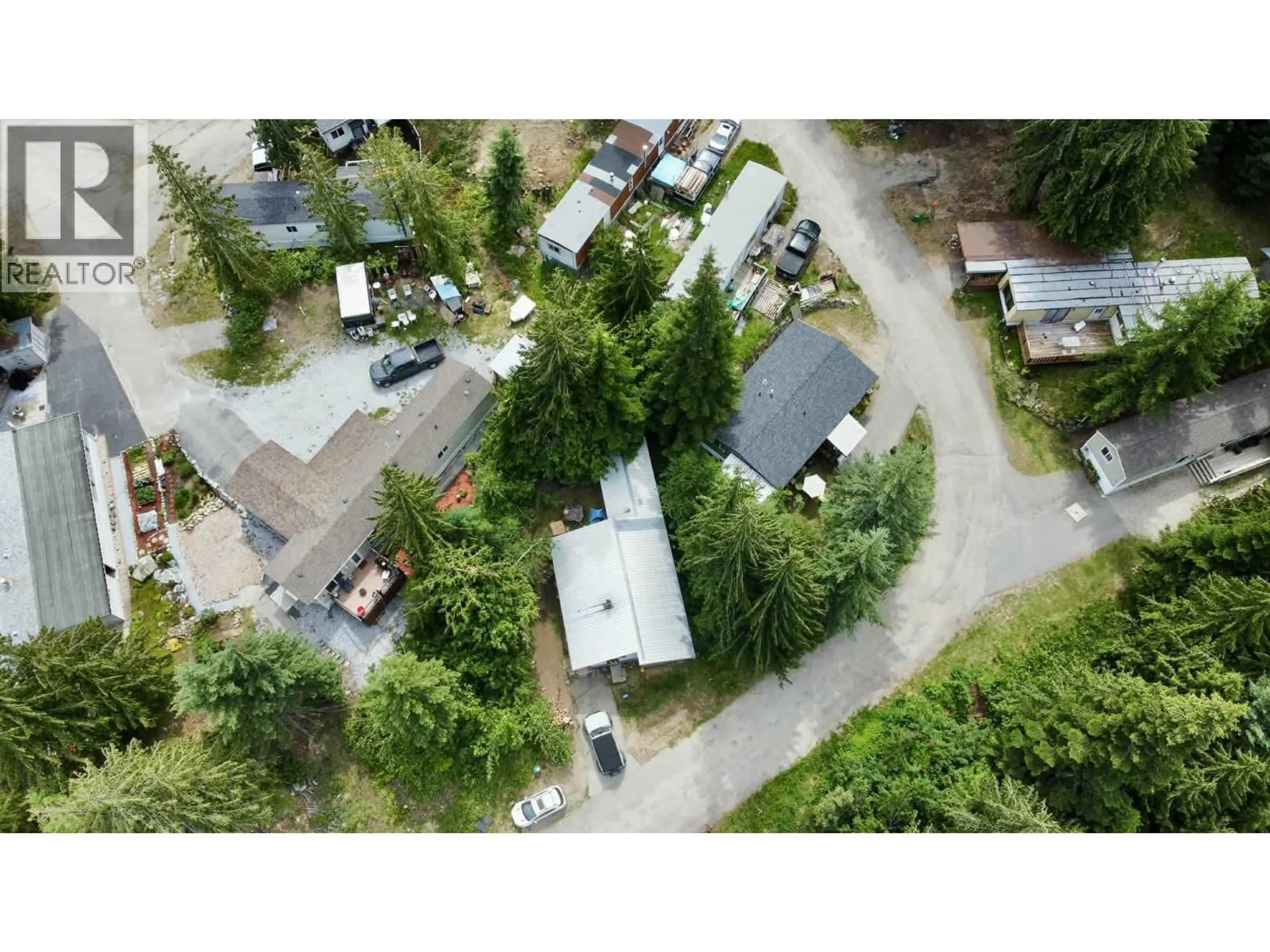 A pic from outside/outdoor area/front of a property/back of a property/a pic from drone, street for 29 - 891 MONTE VISTA DRIVE, Rossland British Columbia V0G1Y0