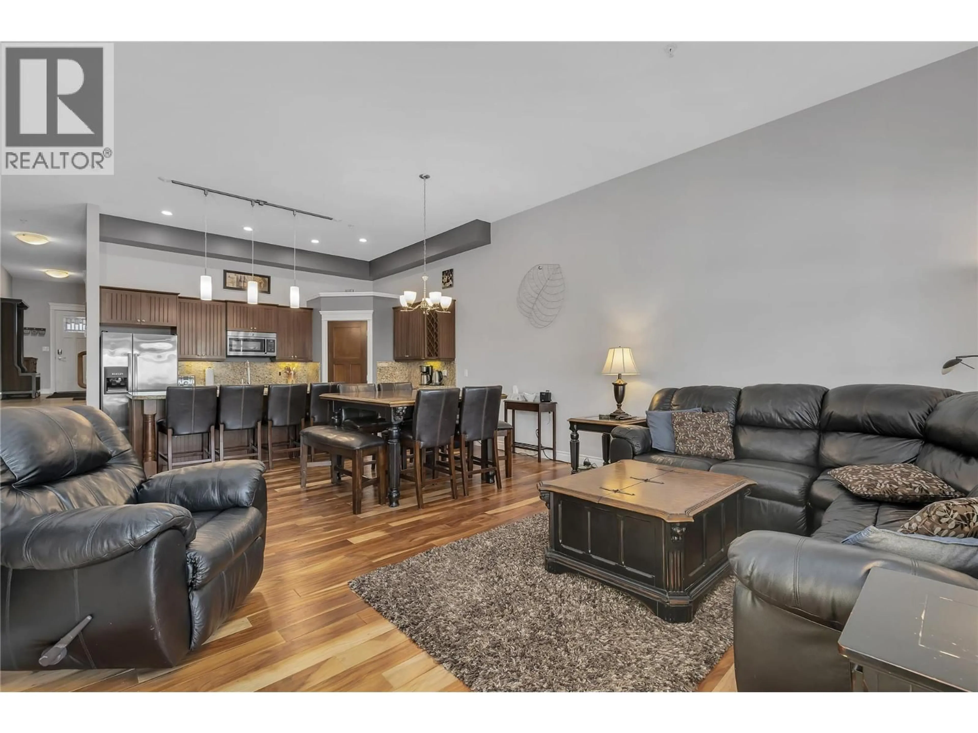 Living room with furniture, wood/laminate floor for 5 - 5045 SNOWBIRD WAY, Big White British Columbia V1P1P3