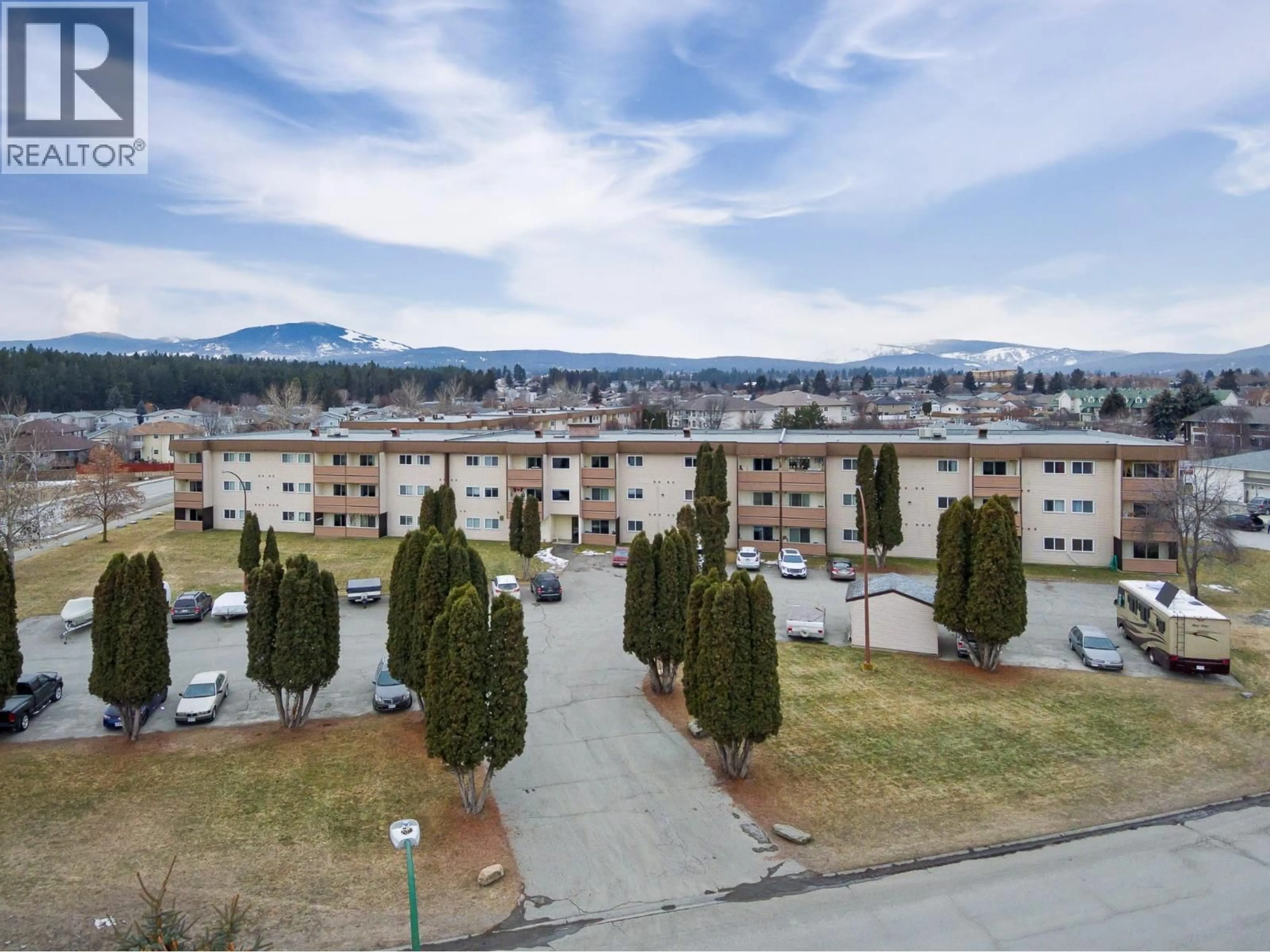 A pic from outside/outdoor area/front of a property/back of a property/a pic from drone, mountain view for 1009 - 2501 12TH STREET NORTH, Cranbrook British Columbia V1C5X3