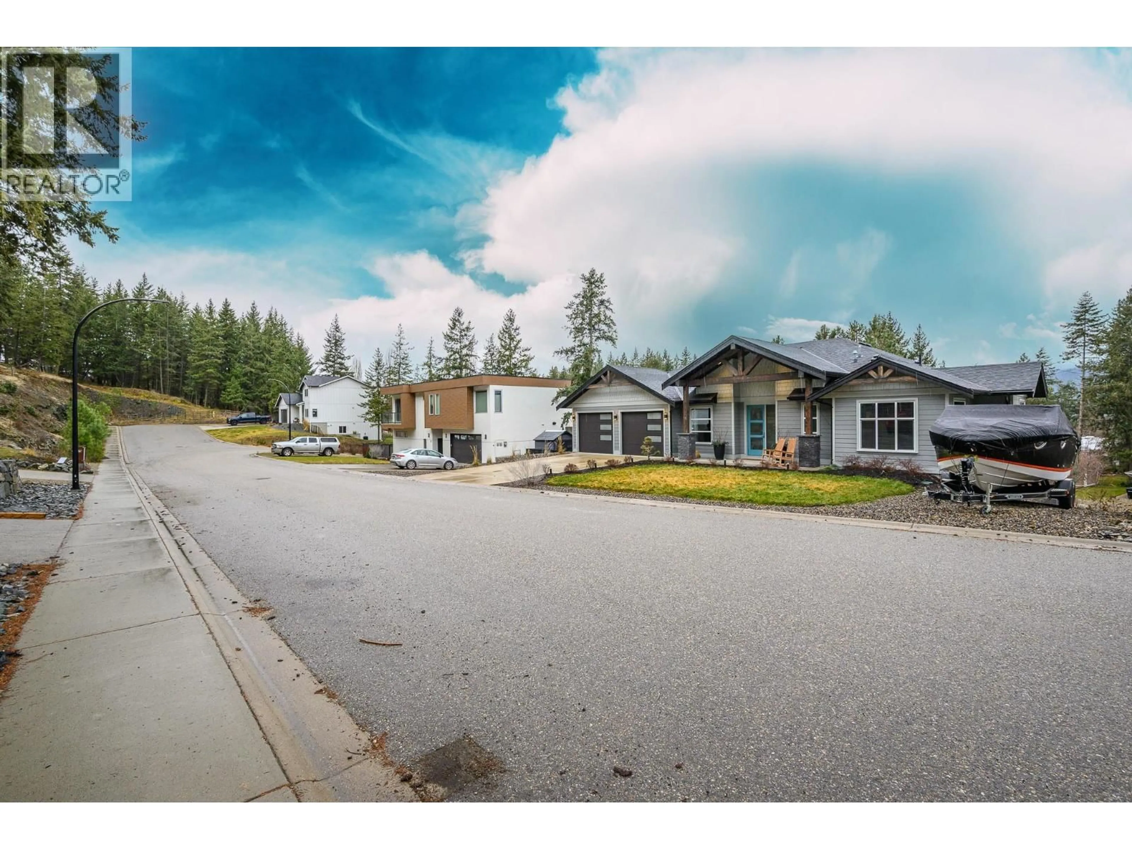 A pic from outside/outdoor area/front of a property/back of a property/a pic from drone, unknown for 16 GARMISCH ROAD, Vernon British Columbia V1H1E3