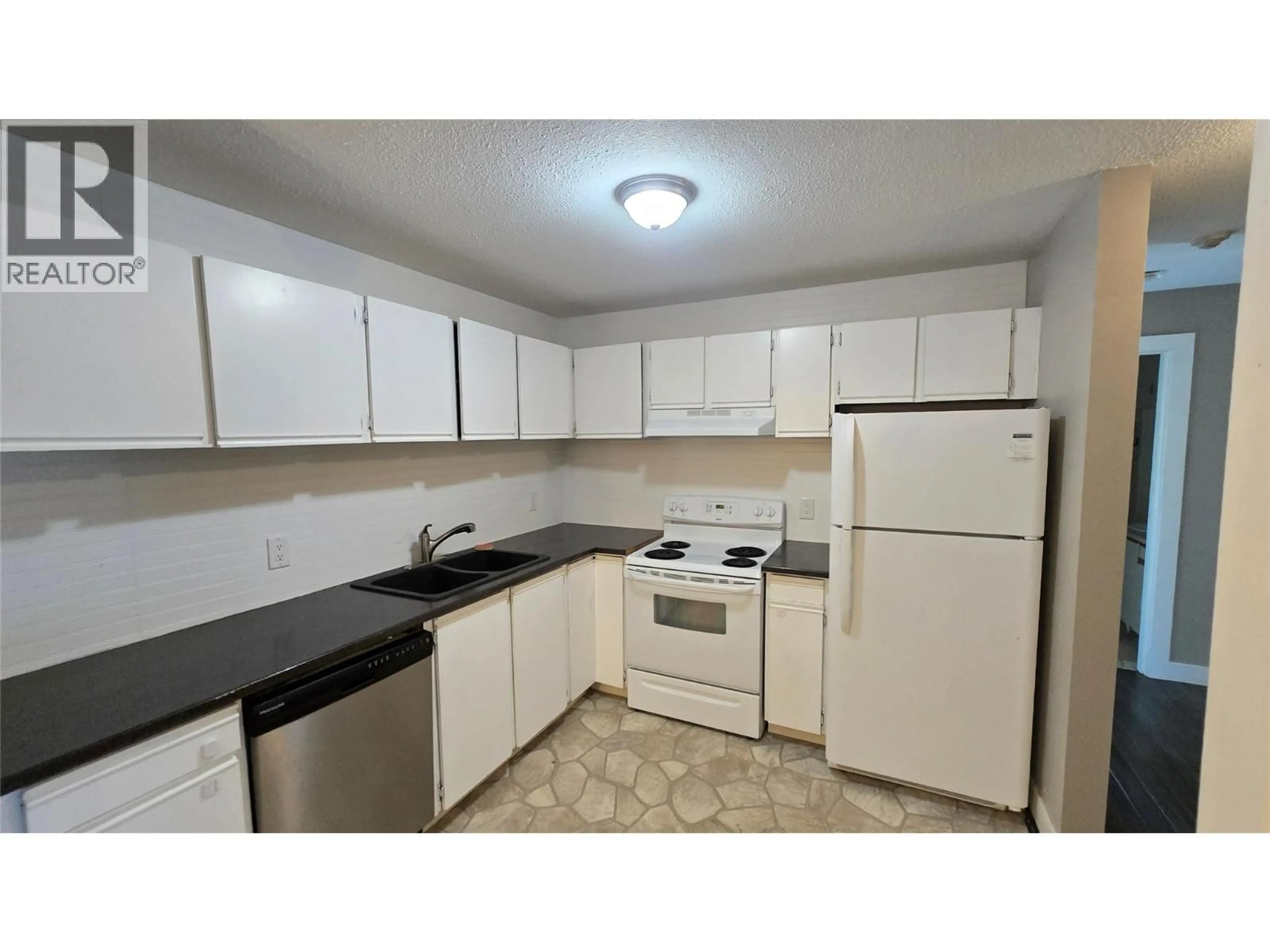 Standard kitchen, wood/laminate floor for 211 - 44 WHITESHIELD S CRESCENT, Kamloops British Columbia V2E2J1