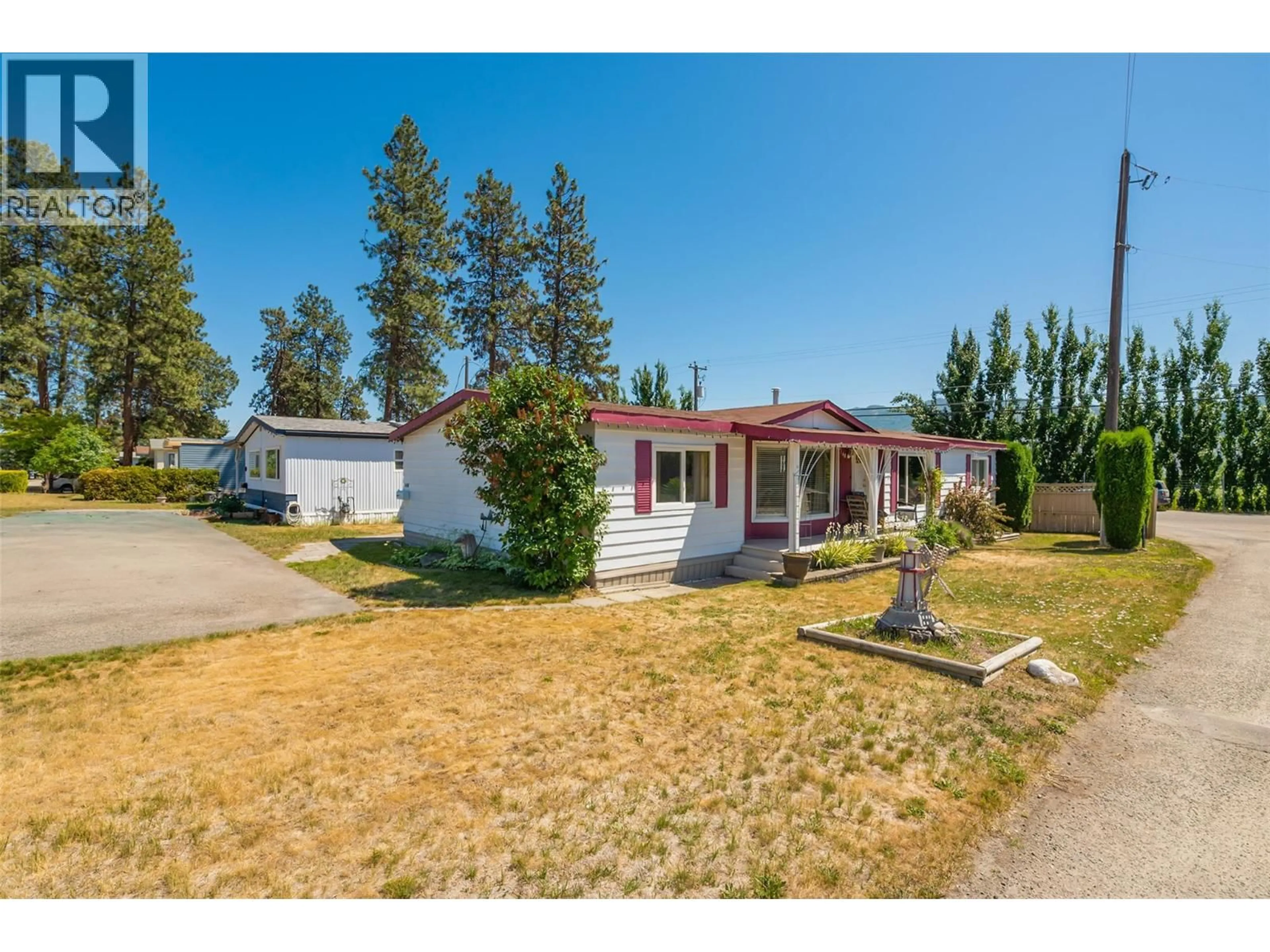 A pic from outside/outdoor area/front of a property/back of a property/a pic from drone, street for 148 - 1880 OLD BOUCHERIE ROAD, West Kelowna British Columbia V4T1Z3