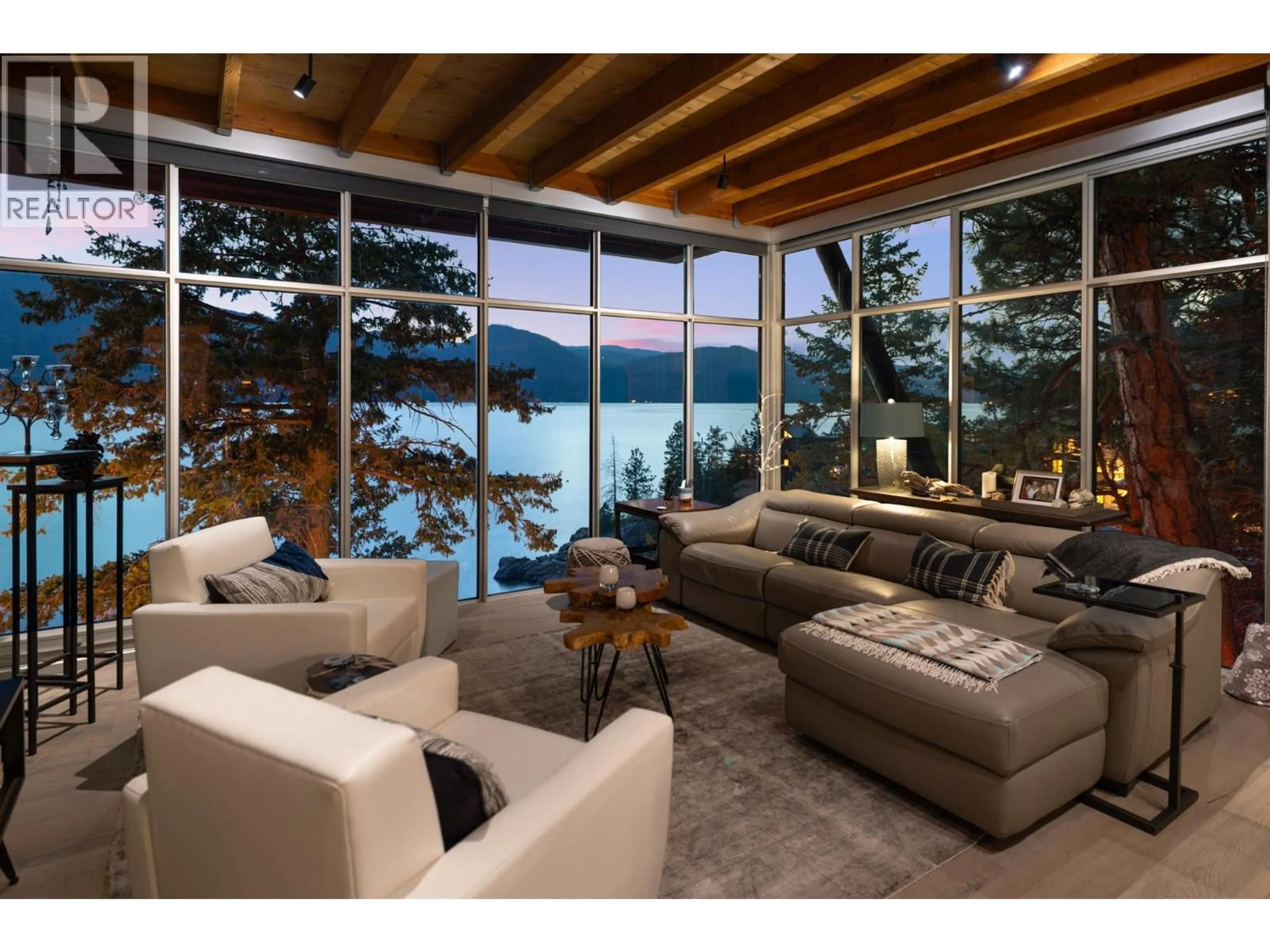 Living room with furniture, unknown for 125 & 126 - 9845 EASTSIDE ROAD, Vernon British Columbia V1H1Z2