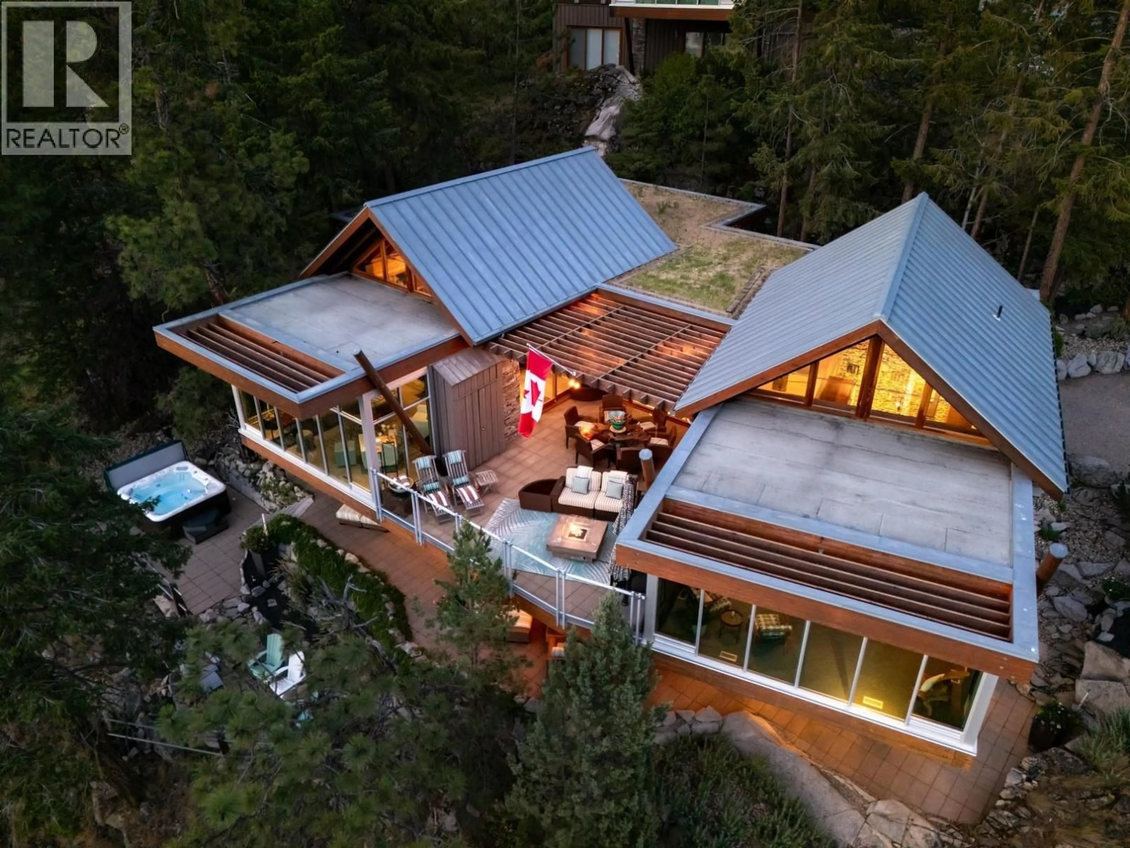 A pic from outside/outdoor area/front of a property/back of a property/a pic from drone, unknown for 125 & 126 - 9845 EASTSIDE ROAD, Vernon British Columbia V1H1Z2