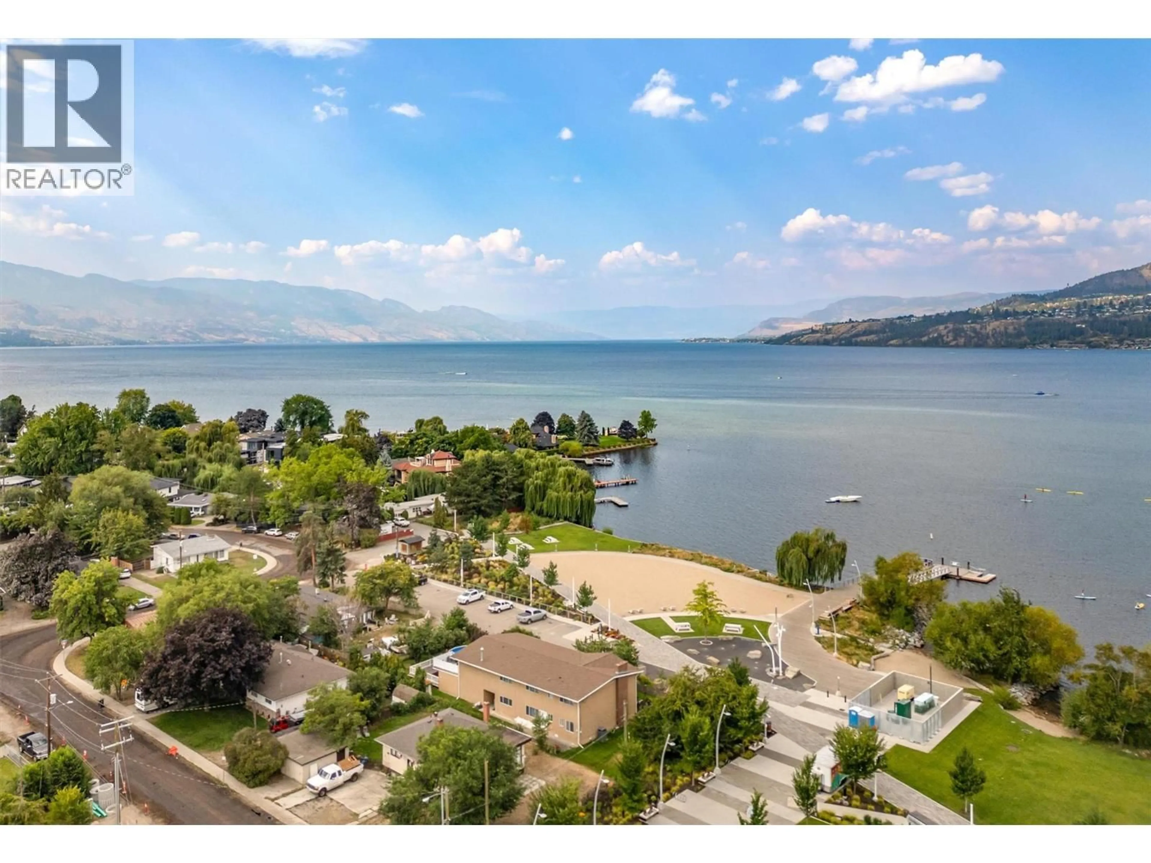 A pic from outside/outdoor area/front of a property/back of a property/a pic from drone, water/lake/river/ocean view for 102 - 450 GROVES AVENUE, Kelowna British Columbia V1Y4Y5