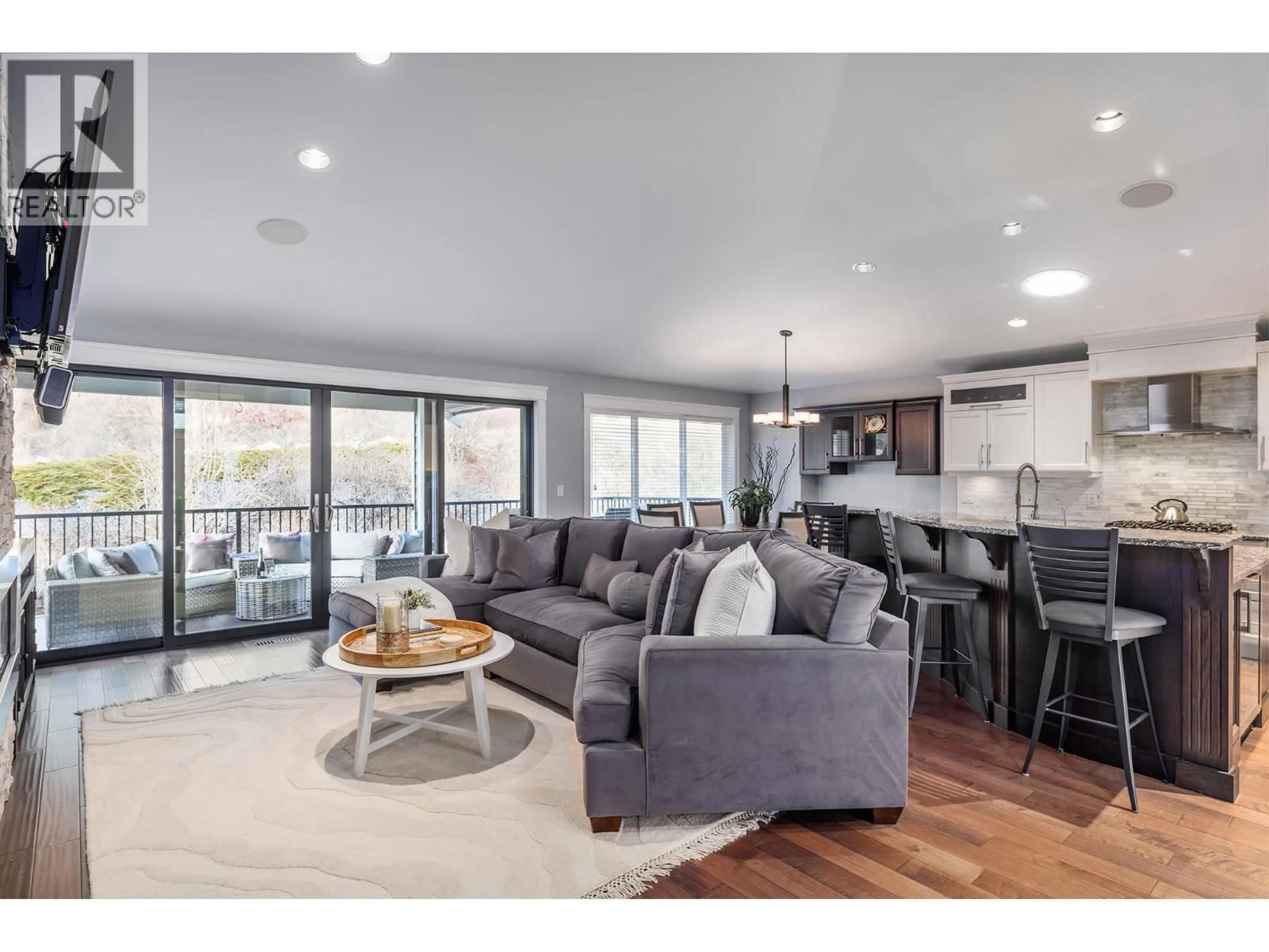 Living room with furniture, wood/laminate floor for 3085 LAKEVIEW COVE ROAD, West Kelowna British Columbia V1Z3P6