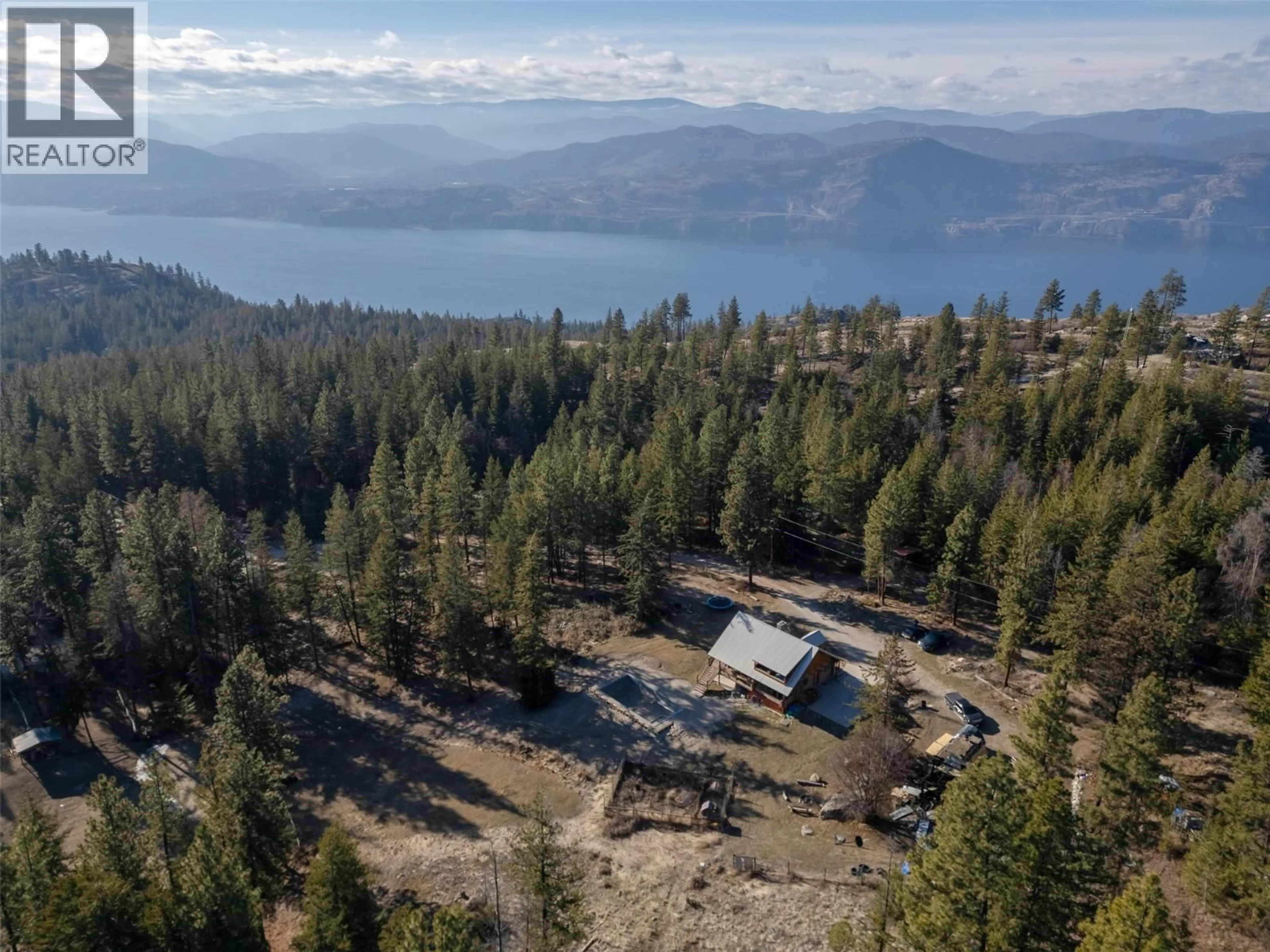 A pic from outside/outdoor area/front of a property/back of a property/a pic from drone, mountain view for 15 - 7080 GLENFIR ROAD, Naramata British Columbia V0H1N1