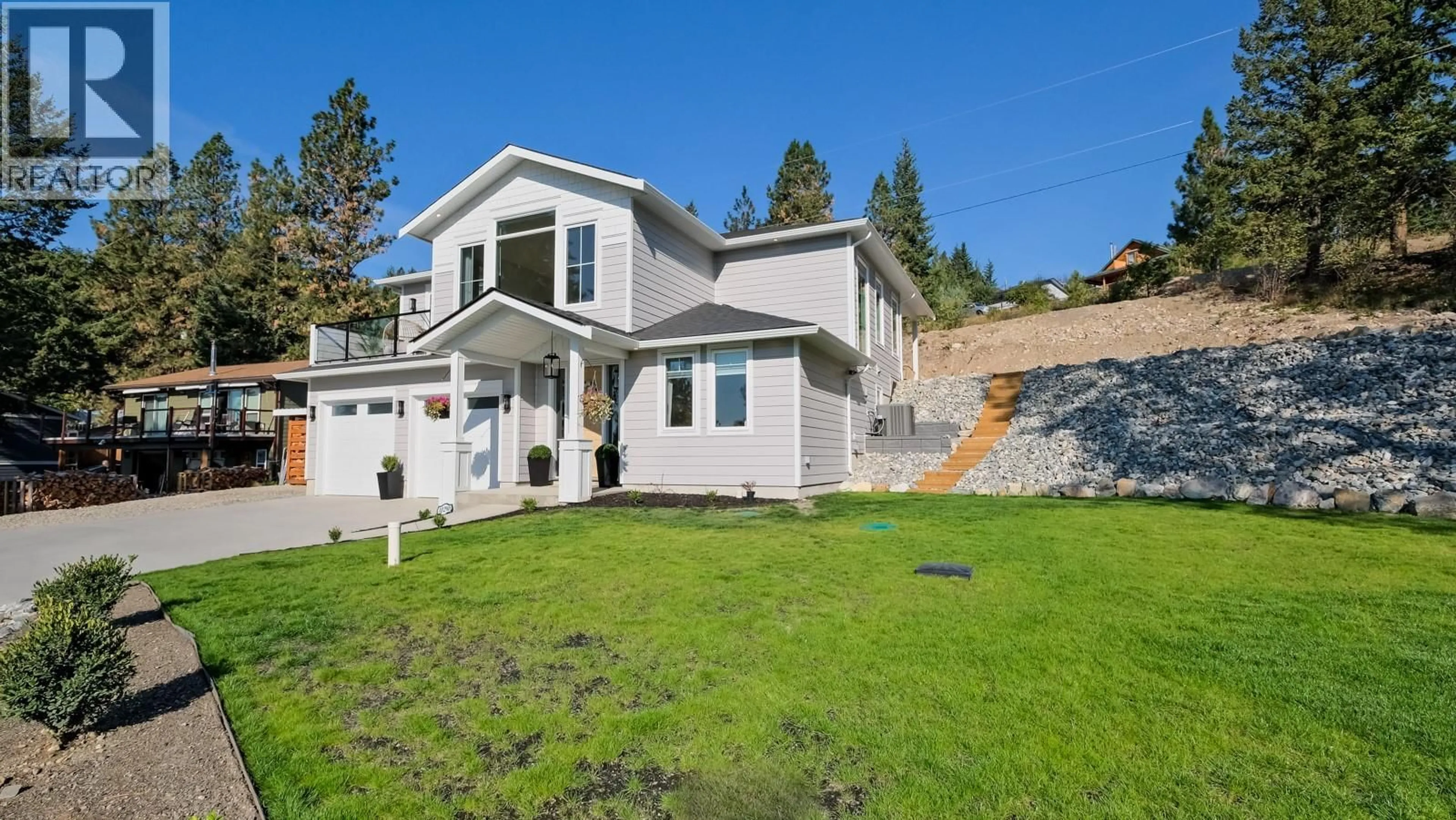 Home with vinyl exterior material, mountain view for 10290 COLUMBIA WAY, Vernon British Columbia V1H2B6