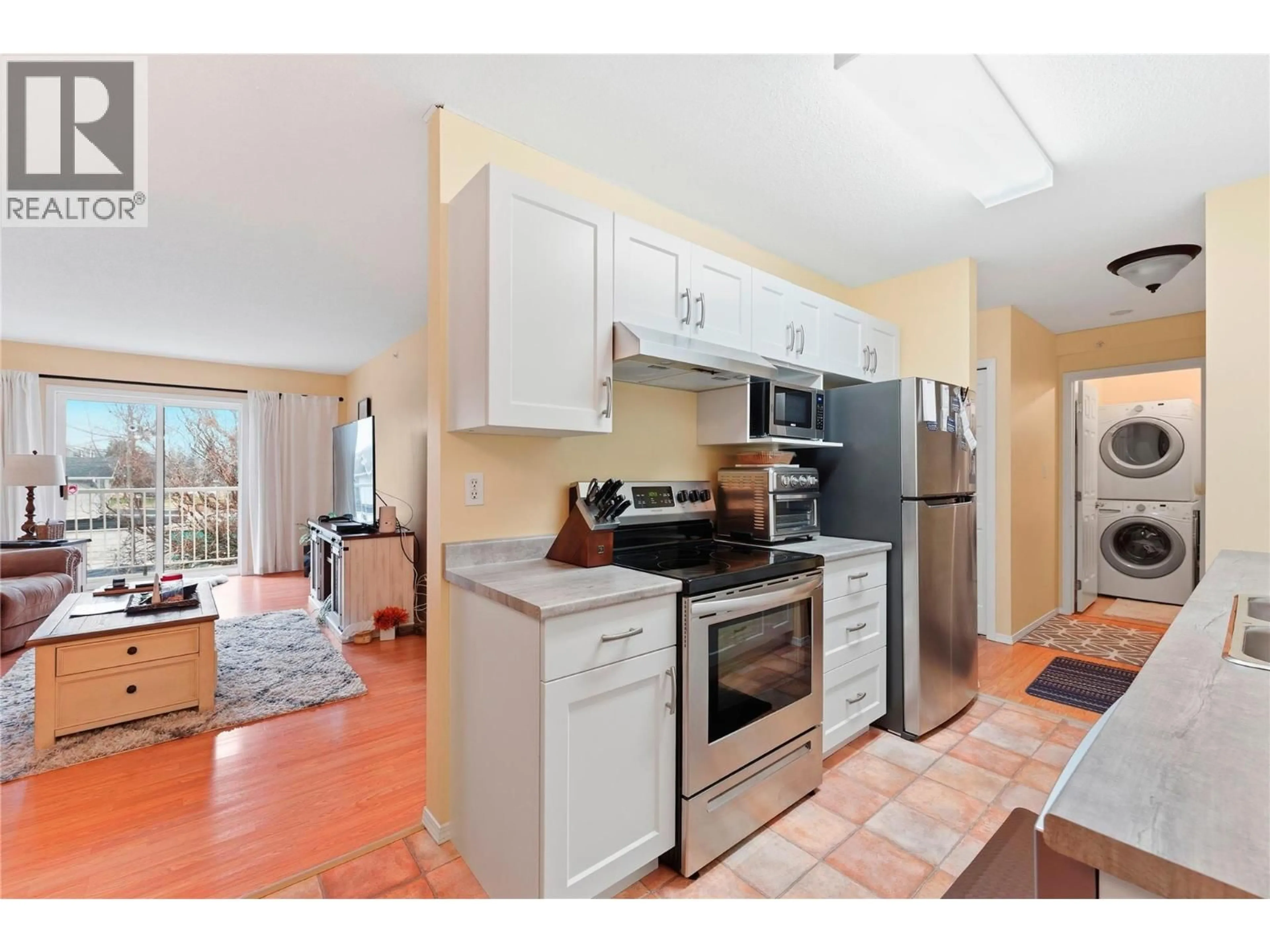 Open concept kitchen, ceramic/tile floor for 405 - 2435 PLEASANT VALLEY ROAD, Armstrong British Columbia V0E1B2