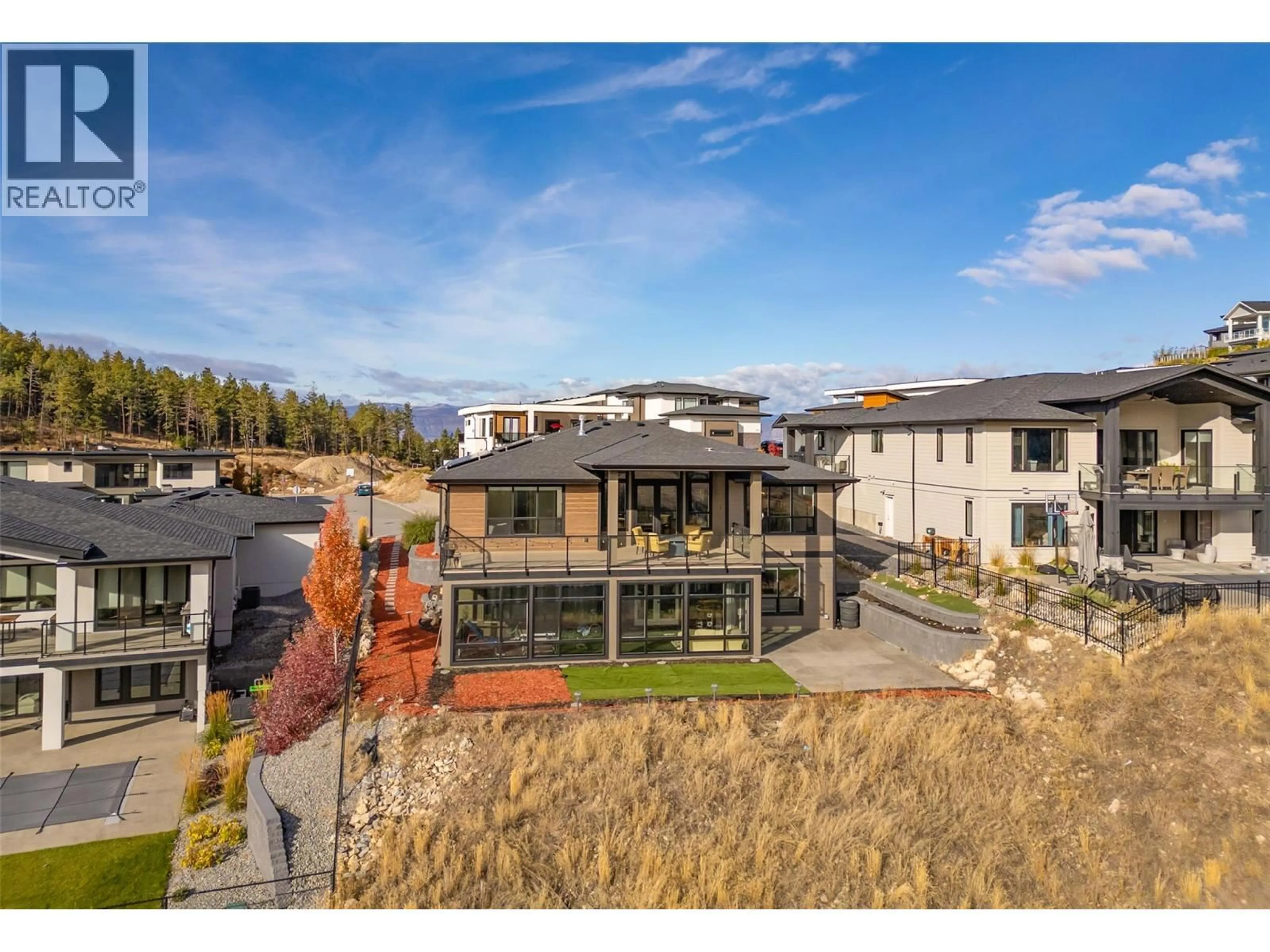 A pic from outside/outdoor area/front of a property/back of a property/a pic from drone, mountain view for 759 CARNOUSTIE DRIVE, Kelowna British Columbia V1P1V2