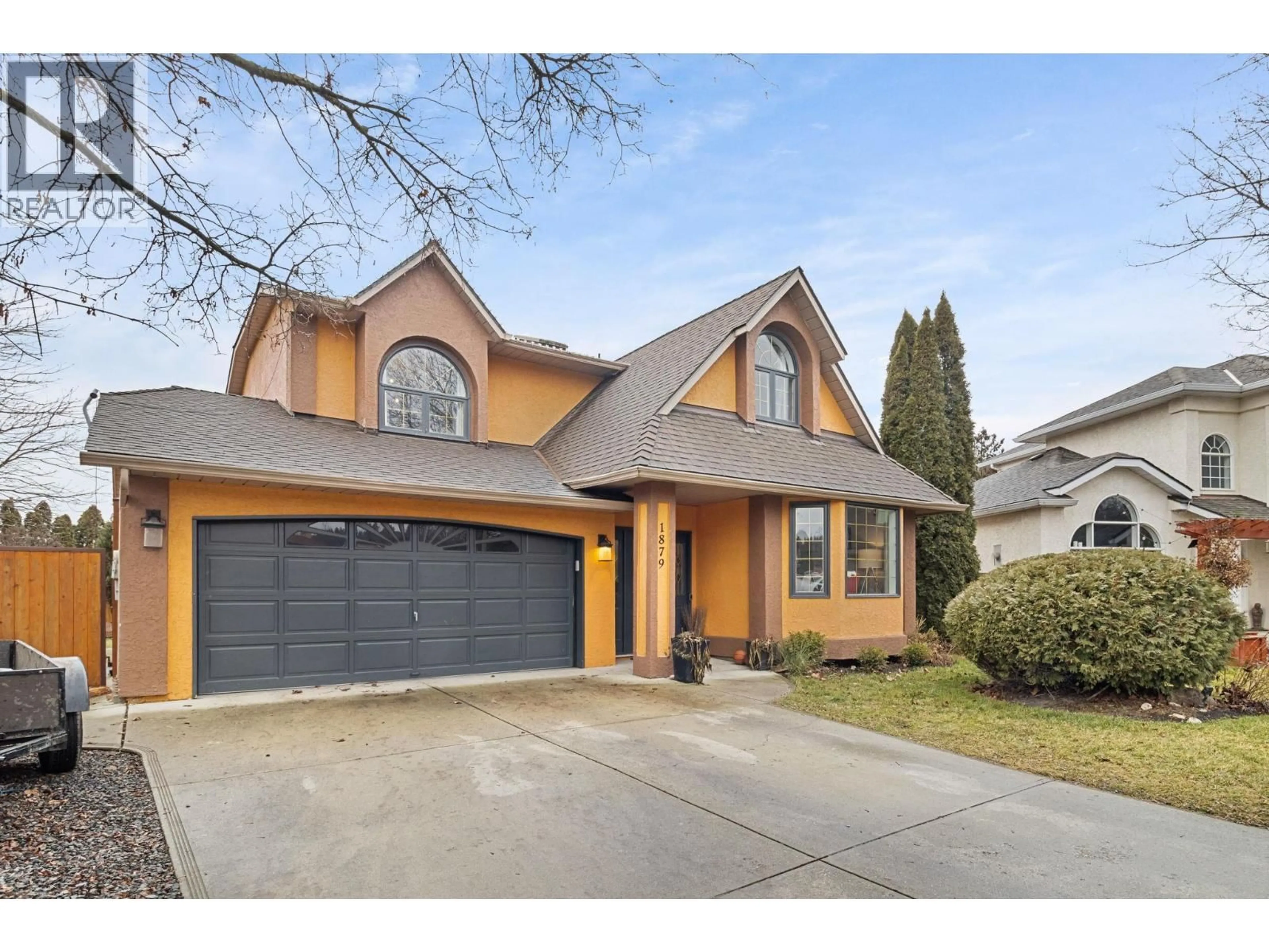 Home with brick exterior material, street for 1879 PORTLAND AVENUE, Kelowna British Columbia V1V1R9