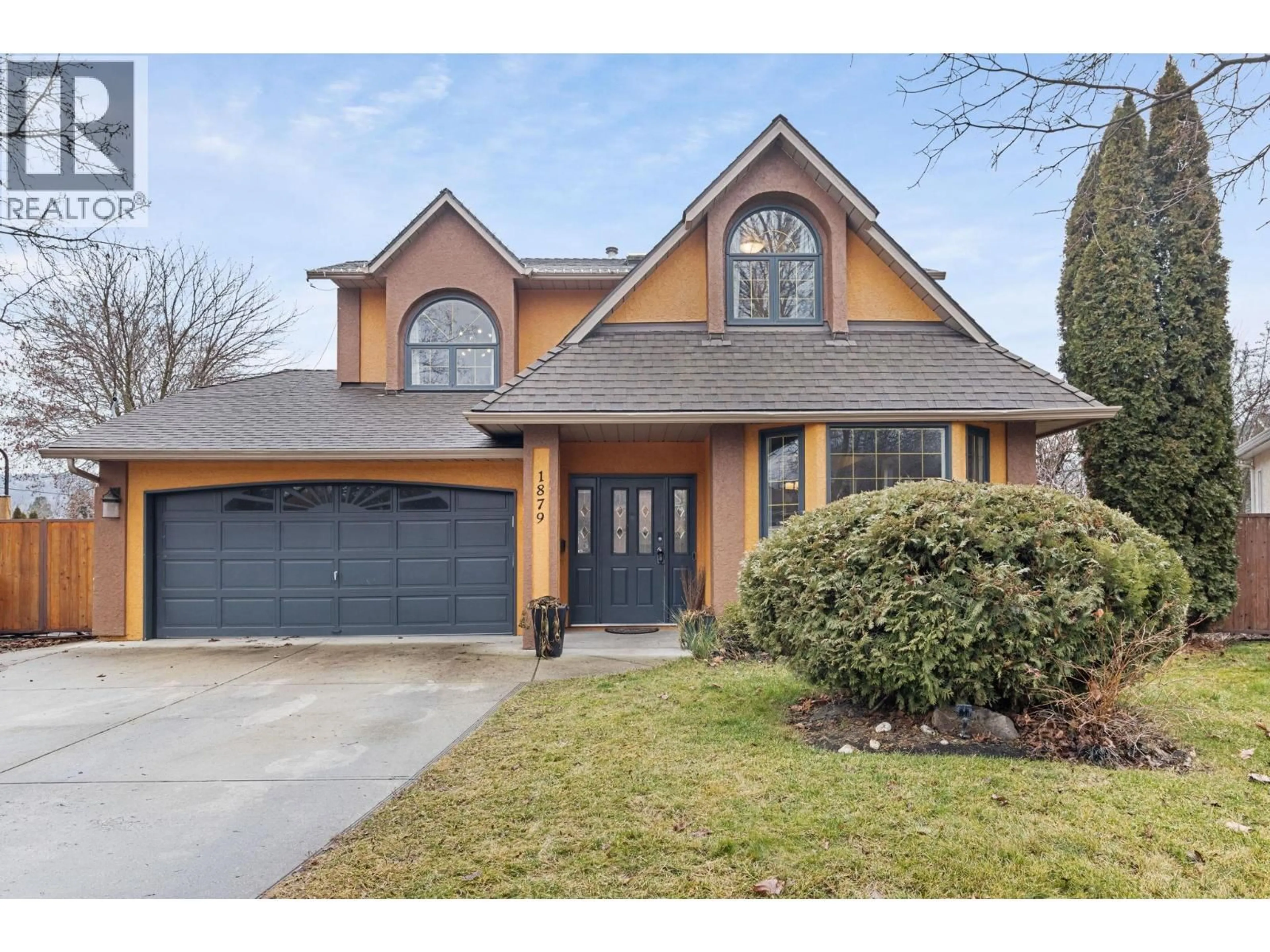 Home with brick exterior material, street for 1879 PORTLAND AVENUE, Kelowna British Columbia V1V1R9