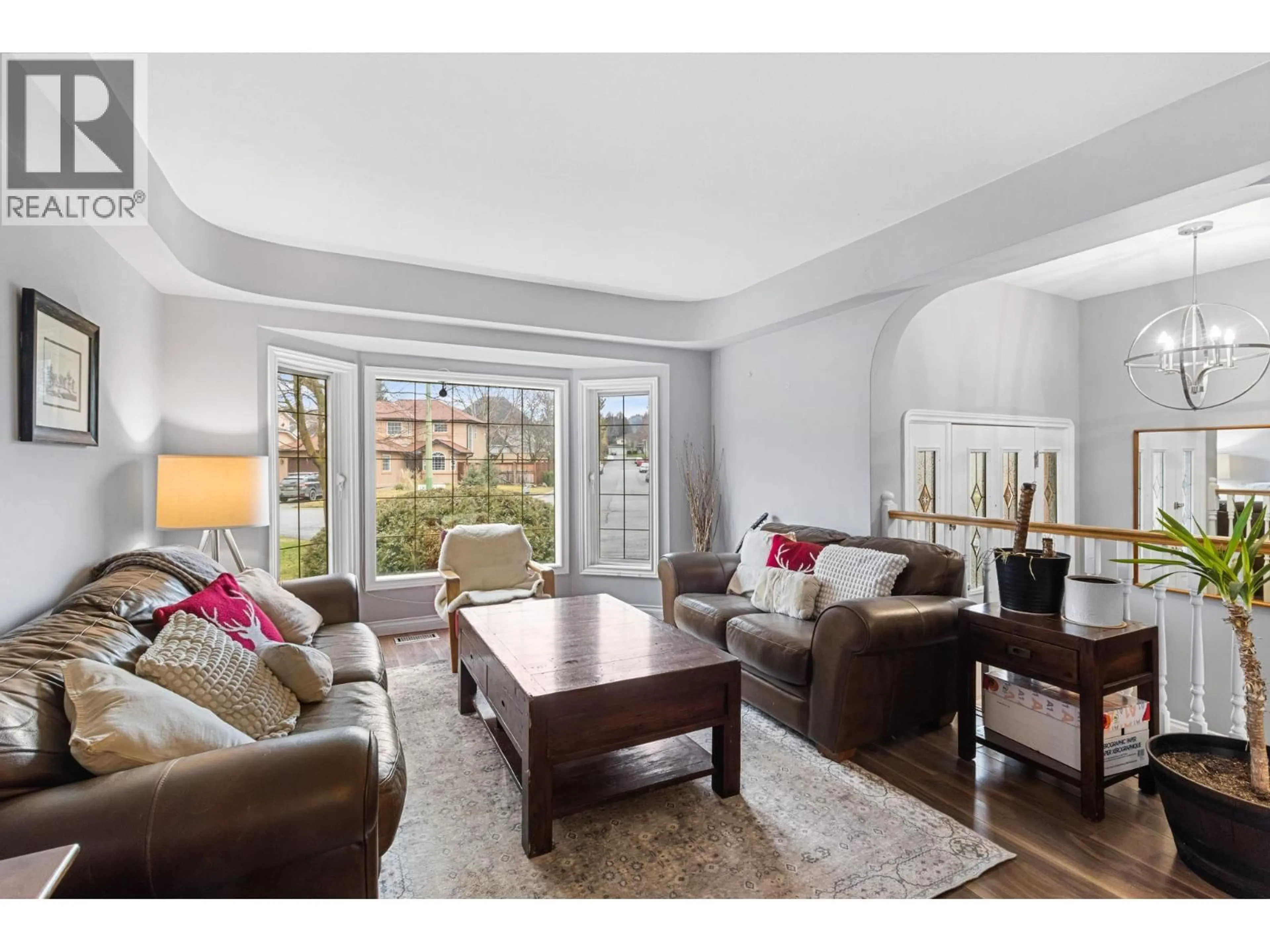 Living room with furniture, unknown for 1879 PORTLAND AVENUE, Kelowna British Columbia V1V1R9