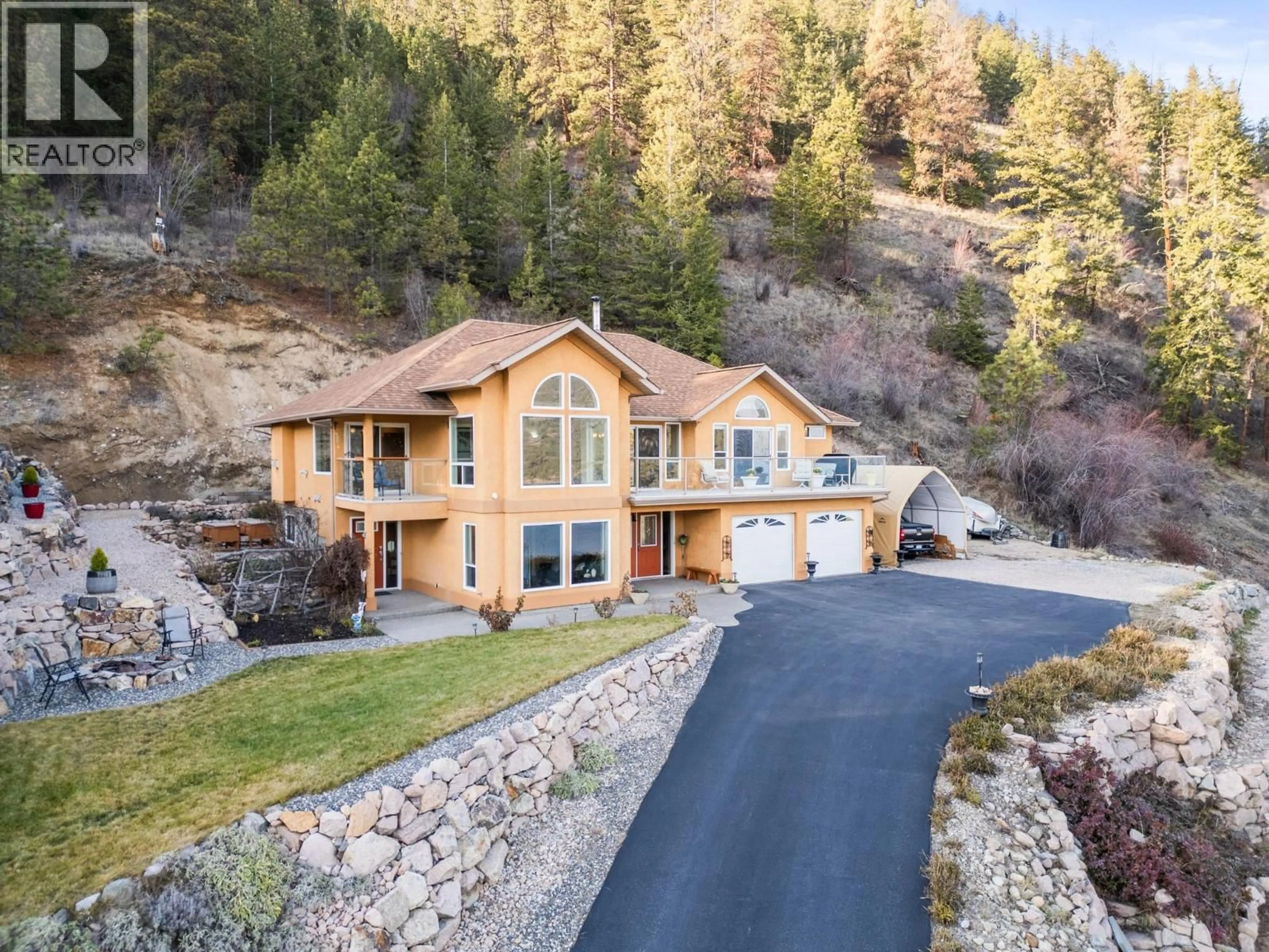 A pic from outside/outdoor area/front of a property/back of a property/a pic from drone, unknown for 16864 GATZKE ROAD, Lake Country British Columbia V4V2J1