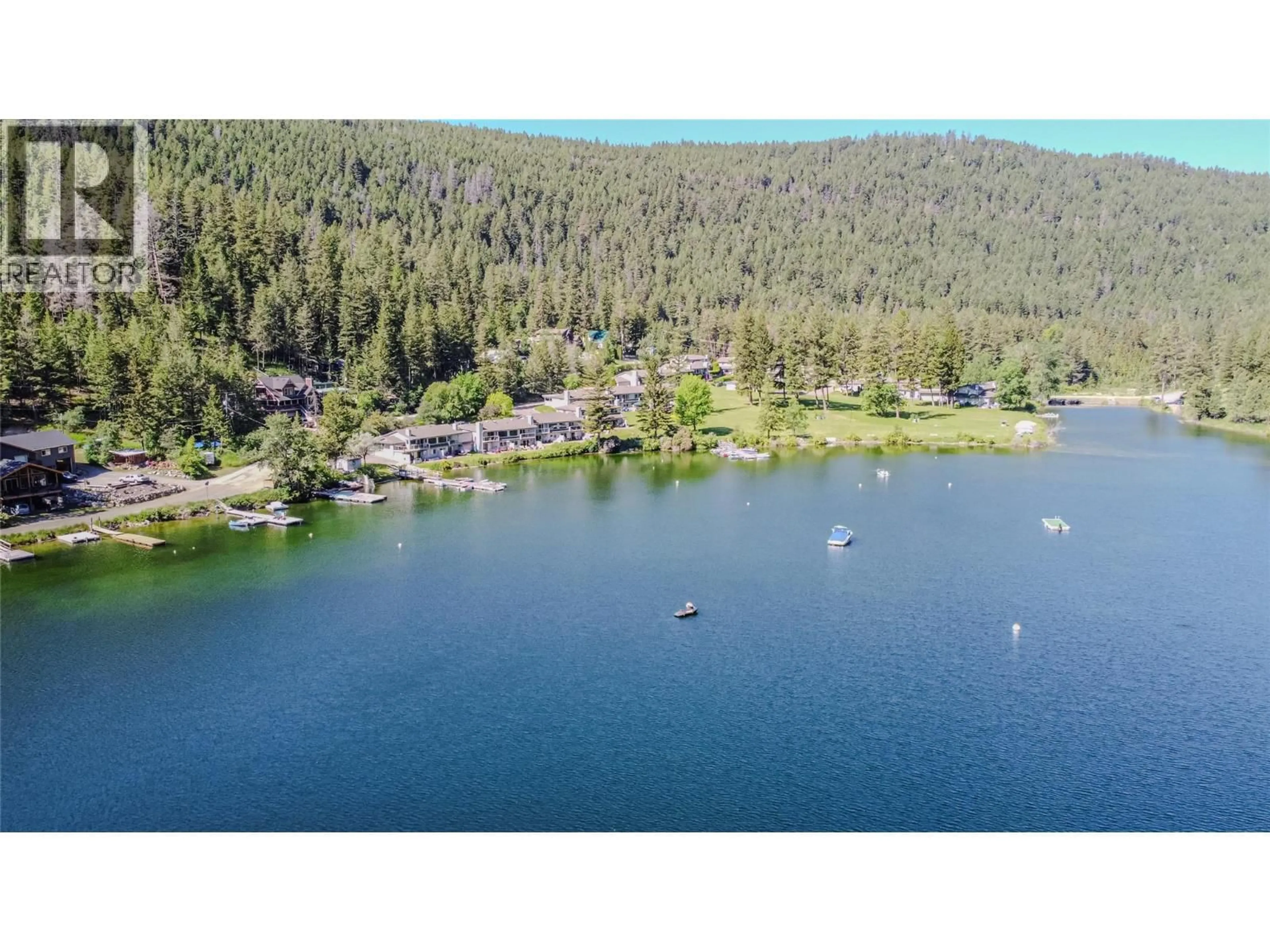 A pic from outside/outdoor area/front of a property/back of a property/a pic from drone, water/lake/river/ocean view for 4 - 1801 PAUL LAKE ROAD, Kamloops British Columbia V2H1N7
