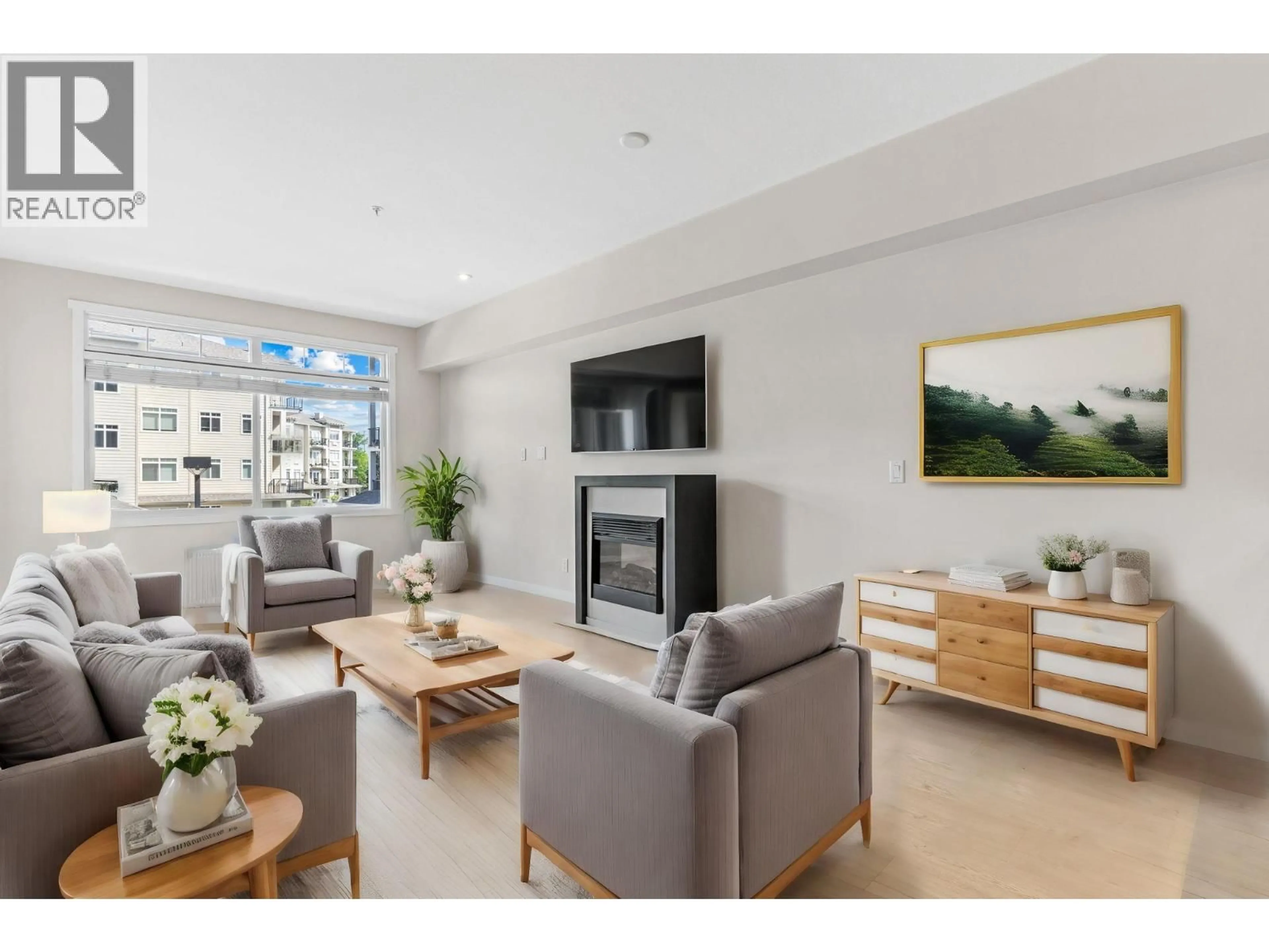 Living room with furniture, unknown for 202 - 1350 RIDGEWAY DRIVE, Kelowna British Columbia V1Y9T8